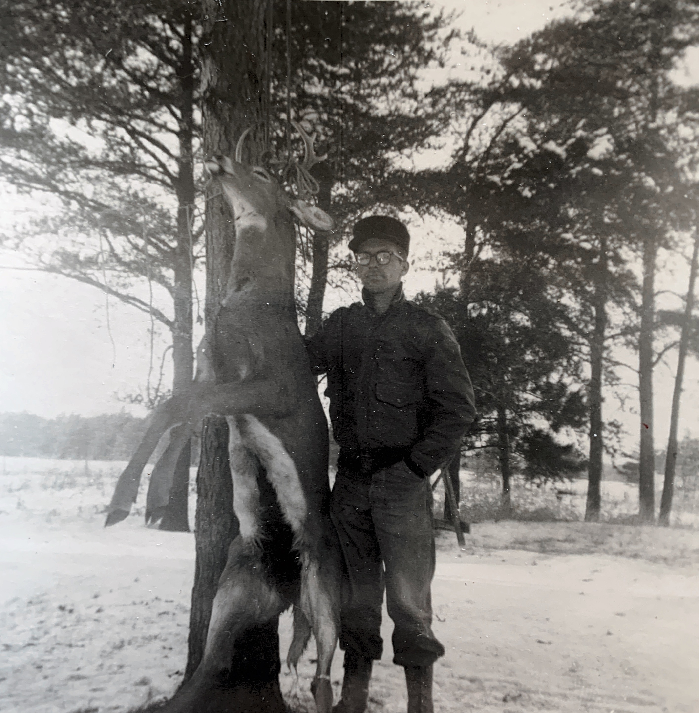 Dick with deer he shot Nov 1955