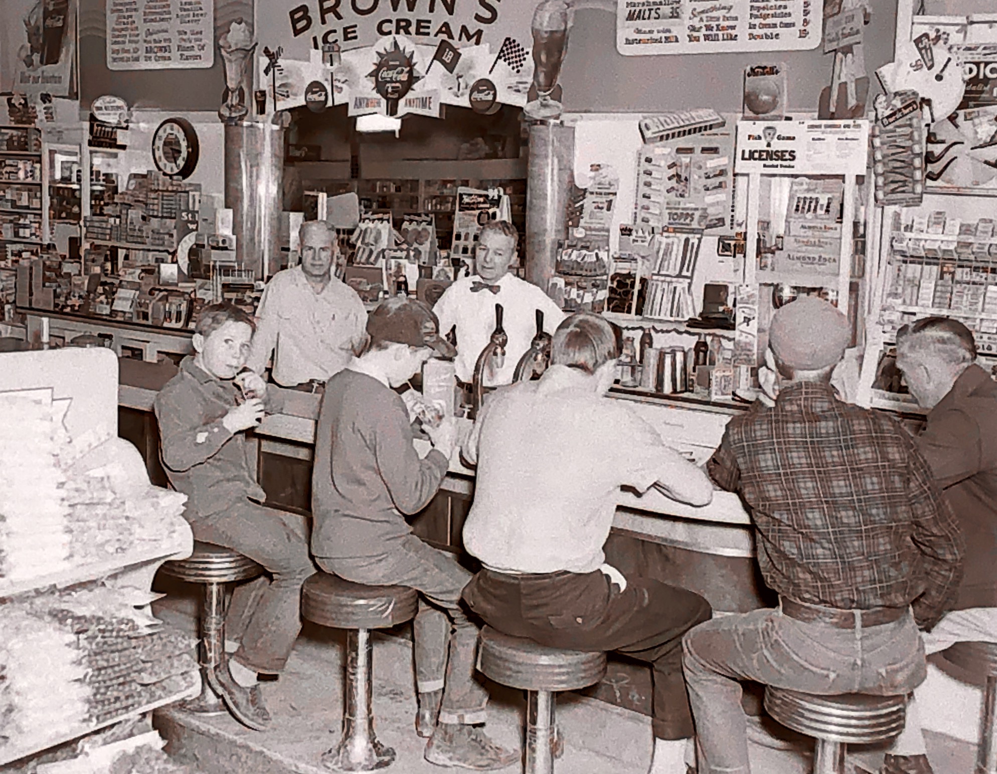 My dad was a photographer and I have a lot of the old negatives. This one shows people at the soda fountain in about 1958, in Arco Idaho. Looks like a good place to have a cold soda or ice cream. I remember one at the drug store when i was growing up, but this one was before I was born. Looks like it ahould have been on an old Norman Rockwell calendar!  I love seeing in these pictures what my dad was seeing through his camera!
