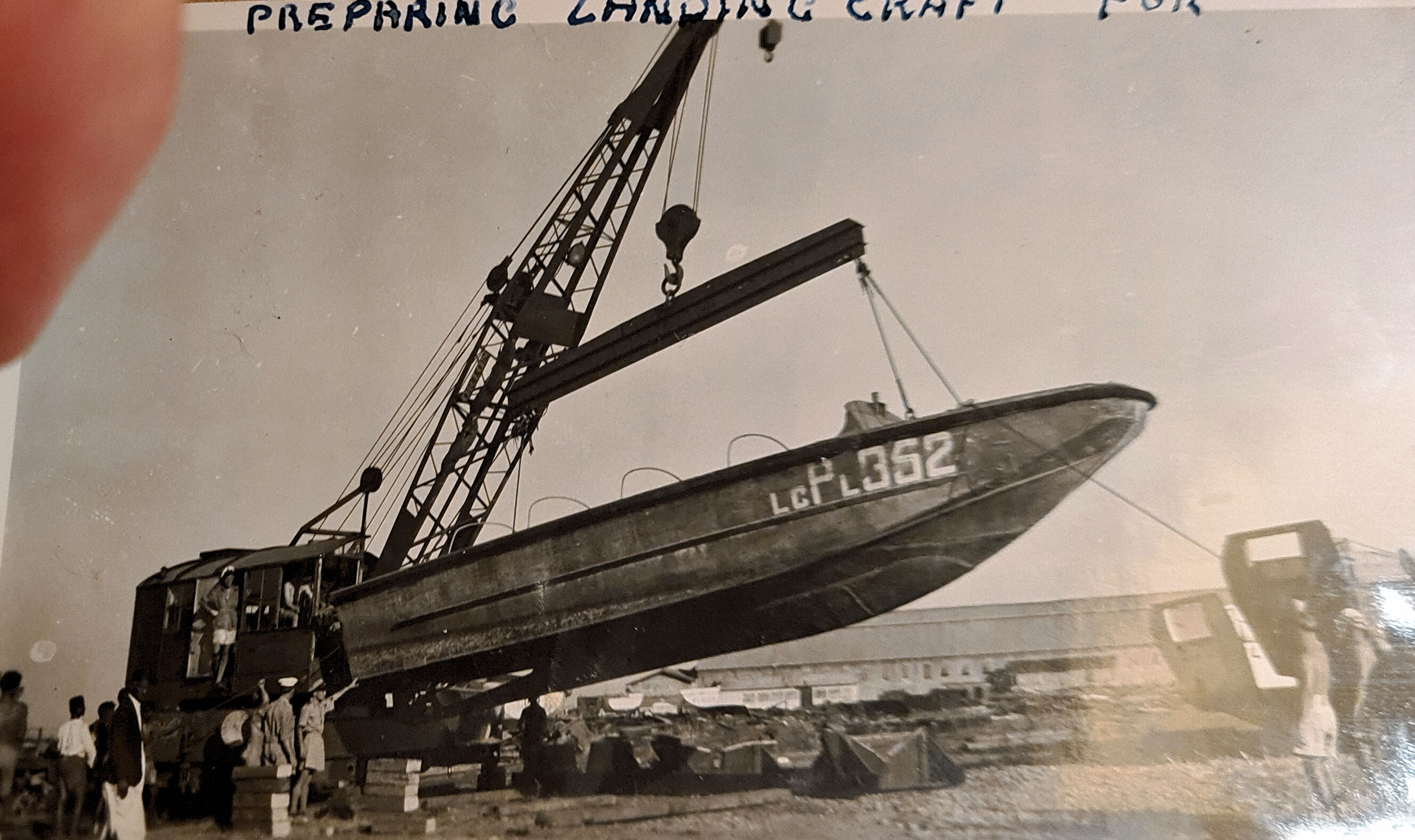 Landing craft LcpI 352 being prepared for scrapping, Bombay harbour 1946