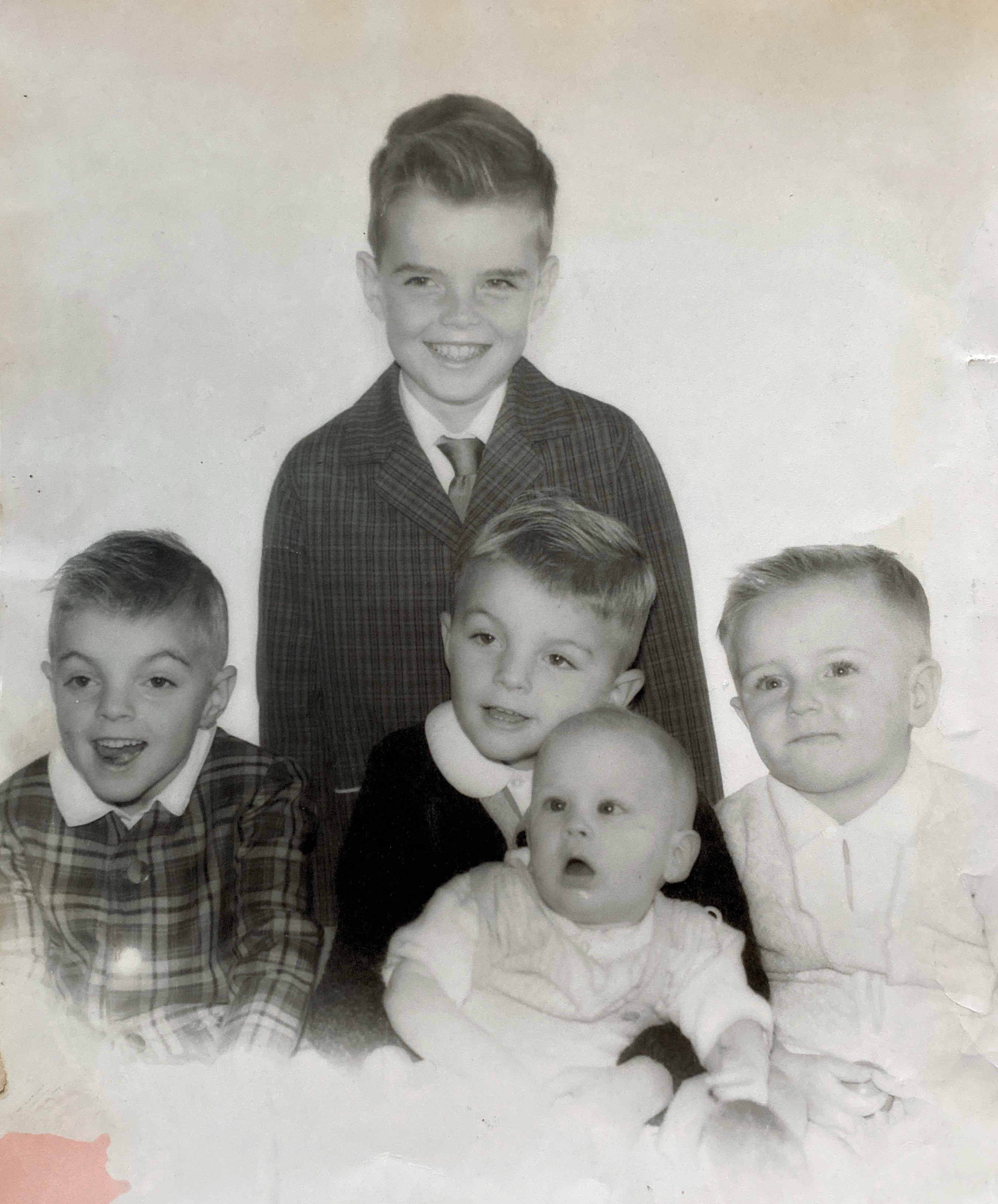 Tom Tkach-7 at the top second row left George Tkach-6, Tim Tkach-5, Dan Tkach-3, and the baby is Mike Tkach. This is the second half of 1962 because Mike is six months or less in age and he was born June 9, 1962