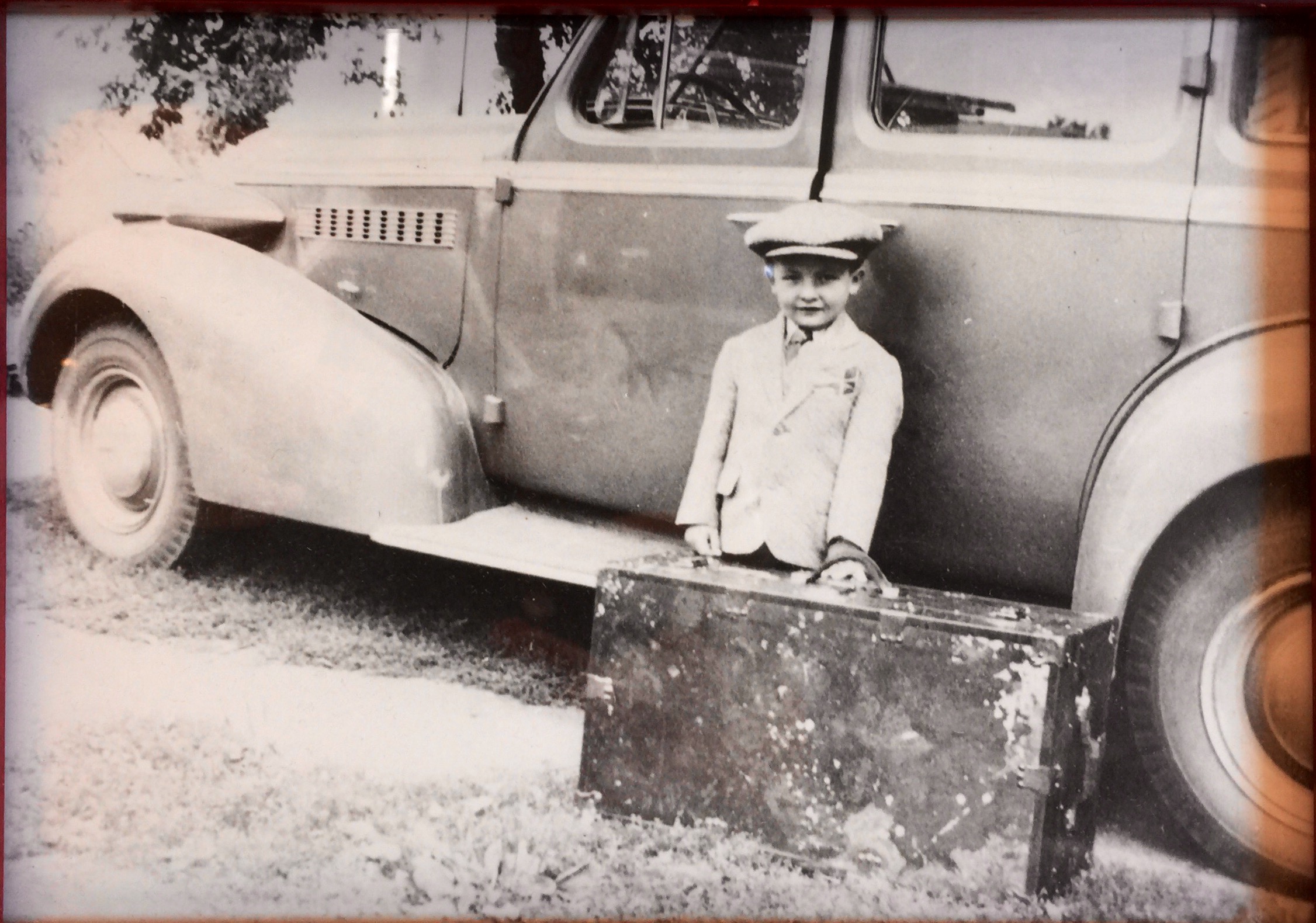 John P Mathews, as he is leaving home at age 5, to attend the Minnesota School for the Deaf. September 1937