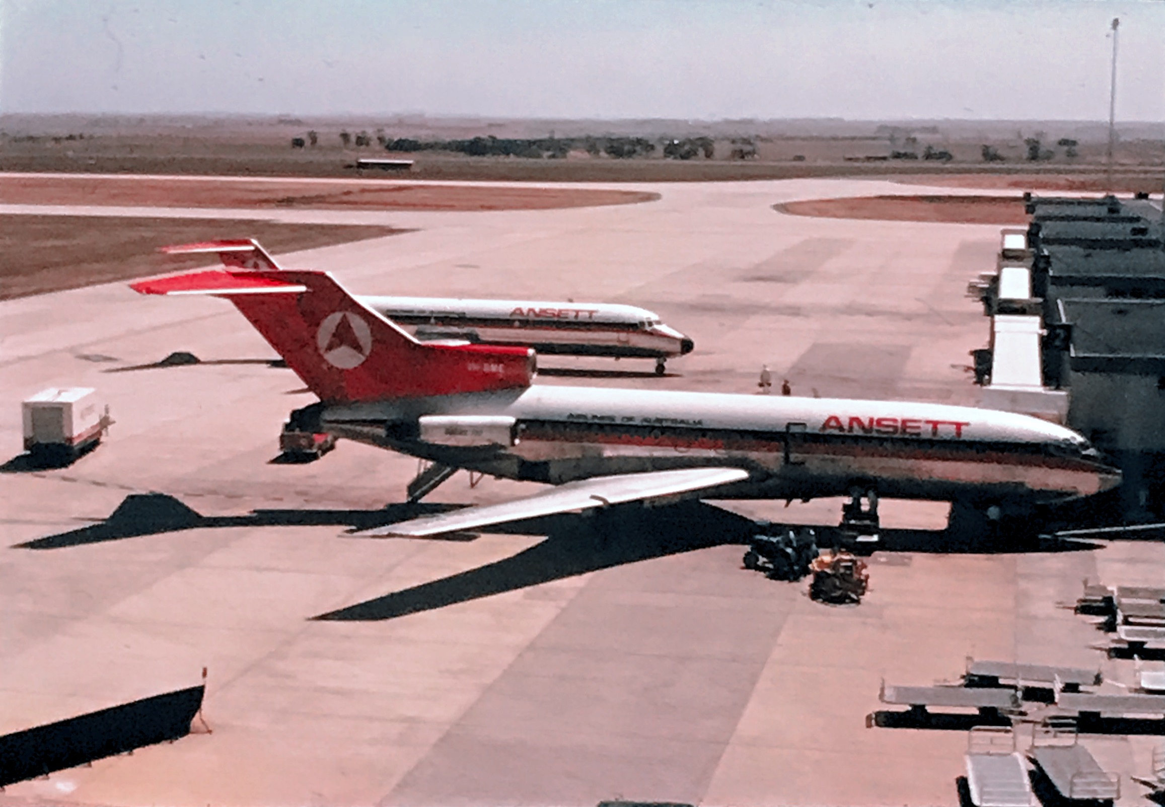 Melbourne Airport in the 1970s. Showing an Ansett Airlines Boeing 727 and a DC9