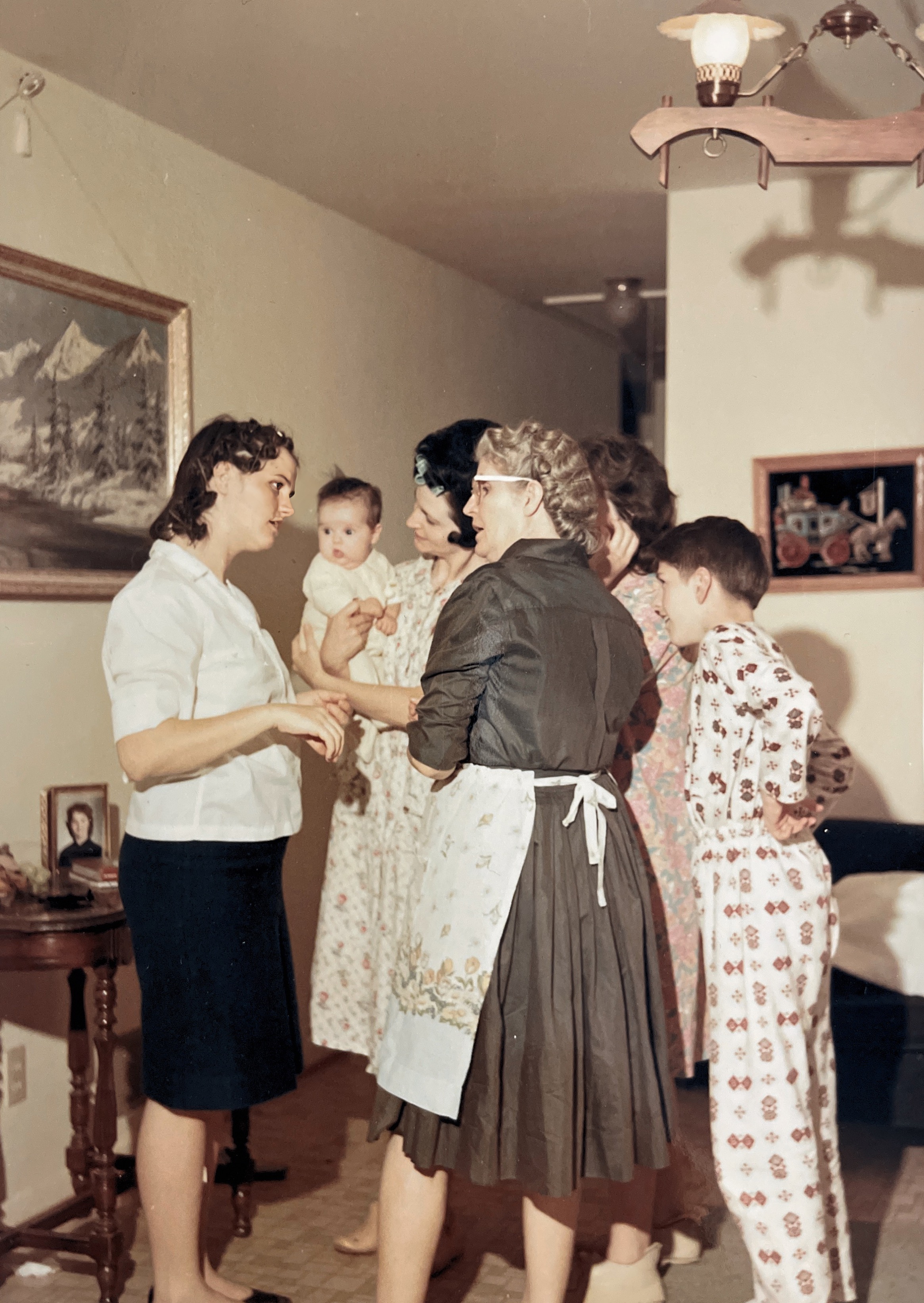 Grandmother Stone’s house with Mom (left), Mary Joan holding Gyalia, Charlotte and Delbert 1966