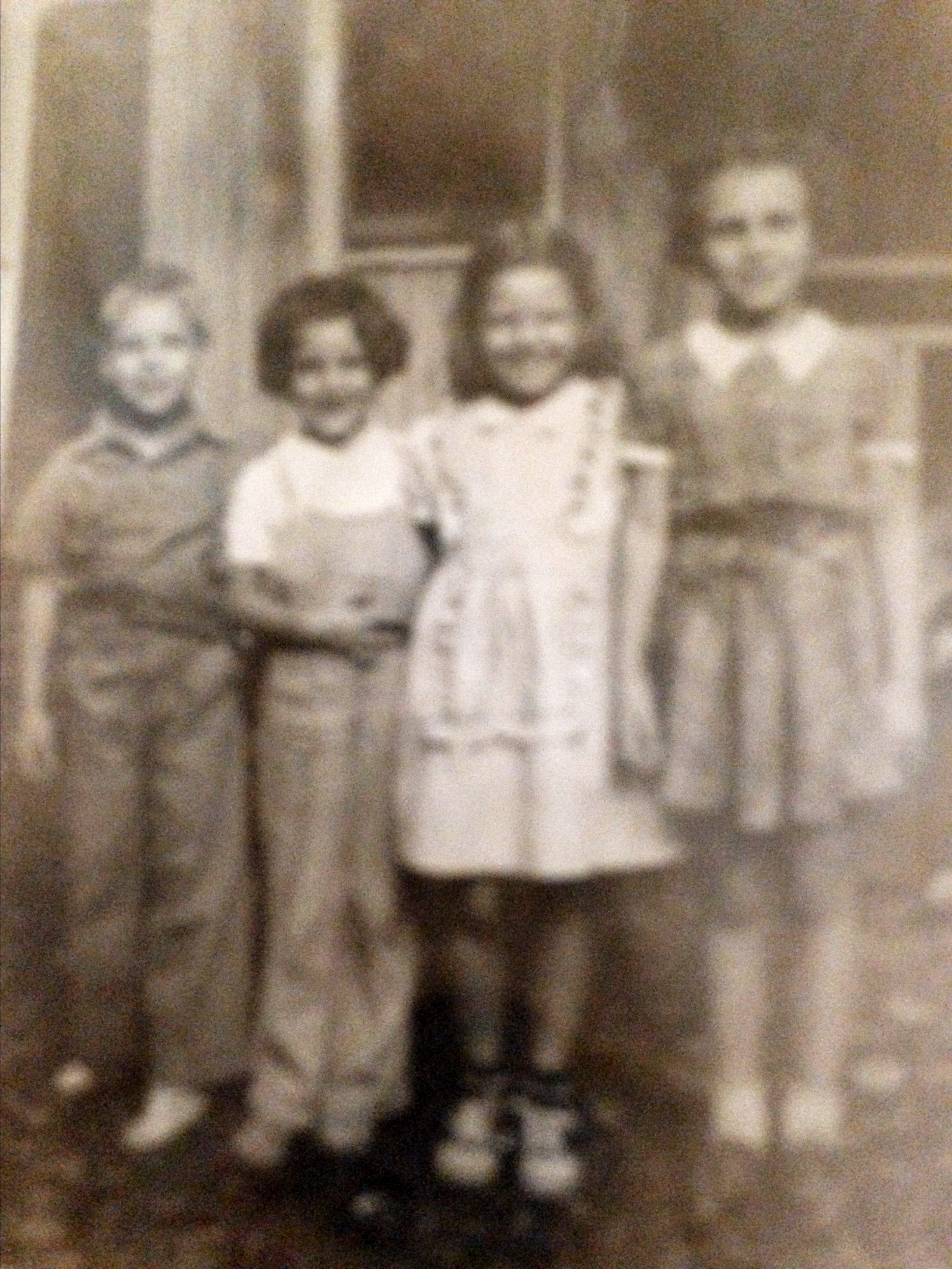 My sister & two cousins at our cabin in the woods 1944 