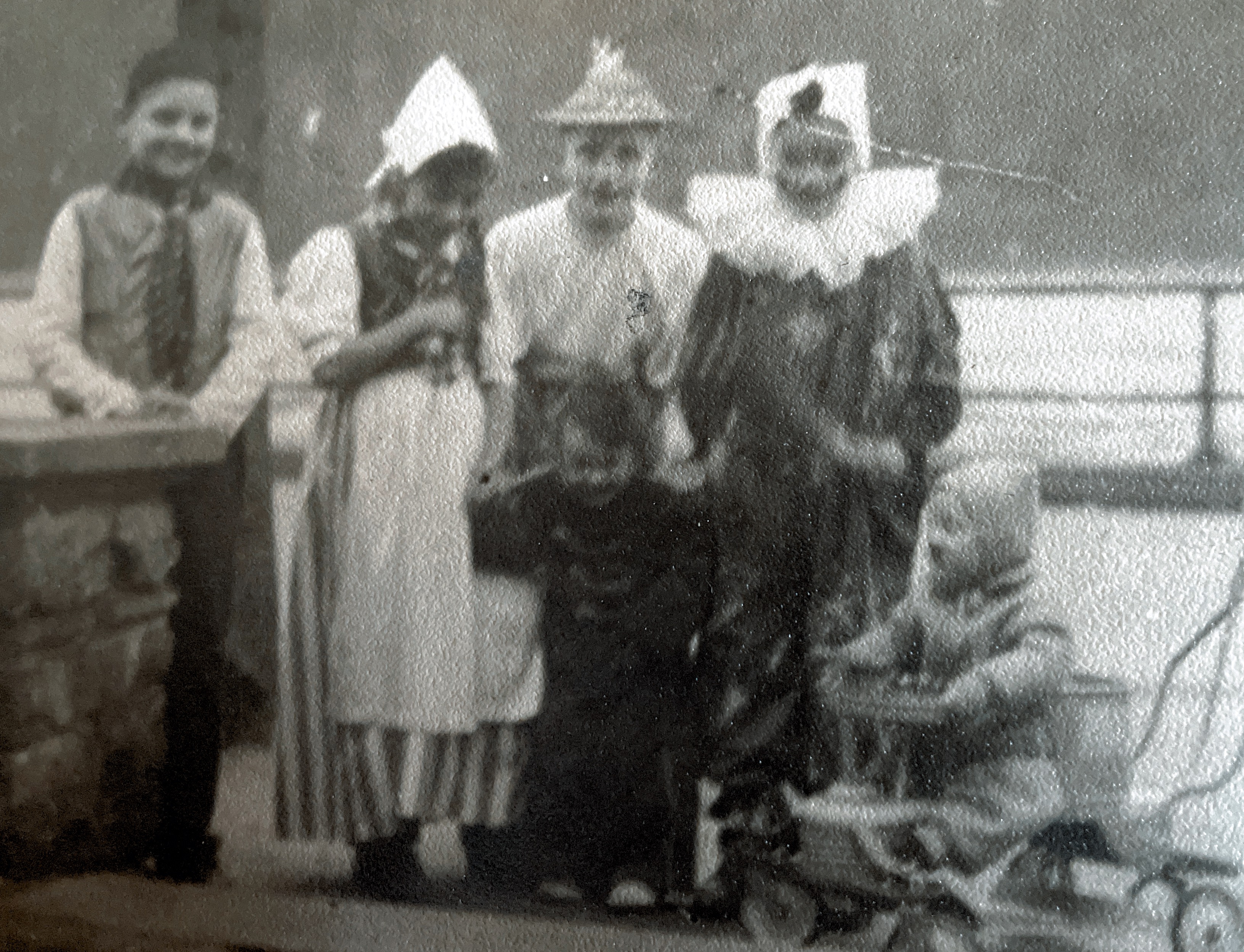 Halloween in Germany. Neighborhood children. 1949 Judy. Is in the center as a bellboy. Billy is in stroller as Hitler. Go figure