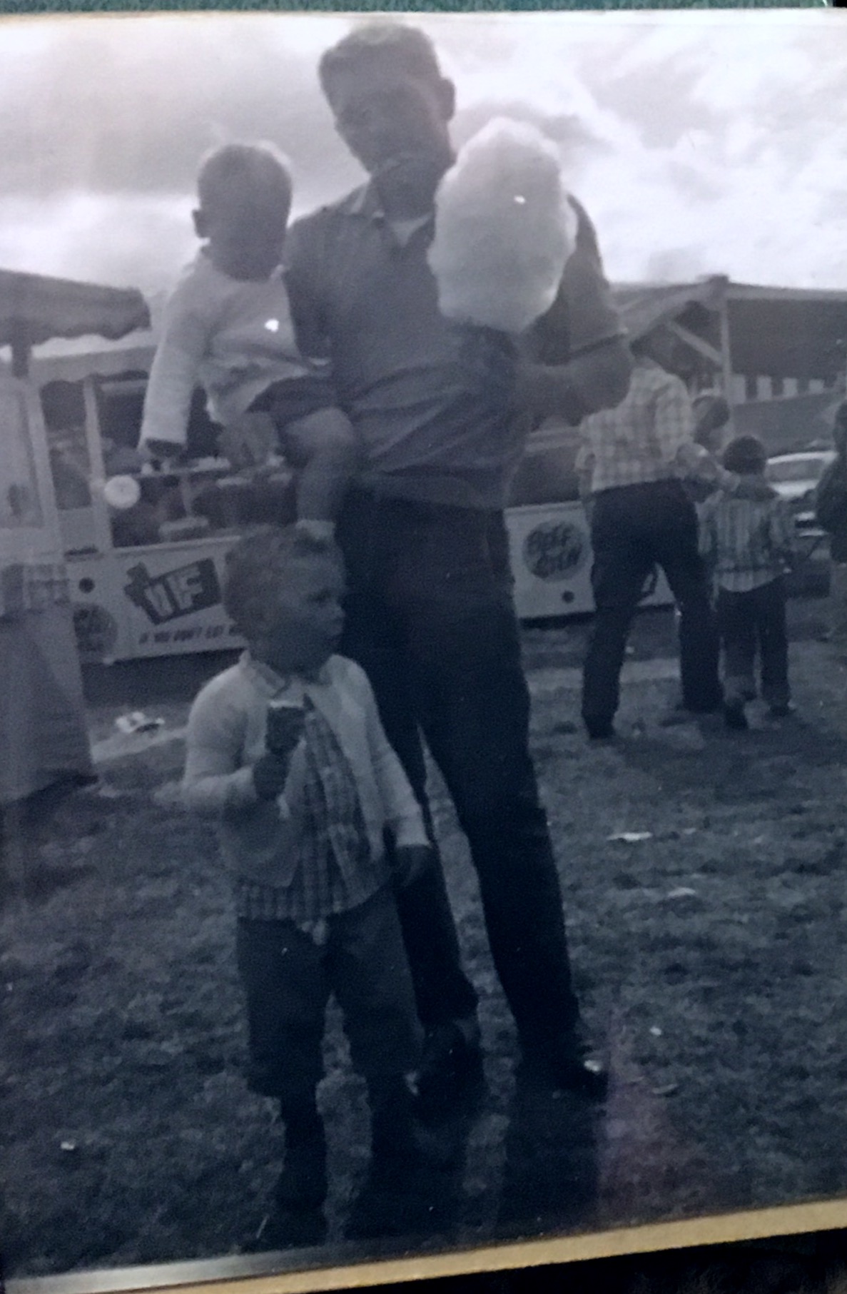 Dad, Chuck and me at the carnival. Bend, Oregon 1961