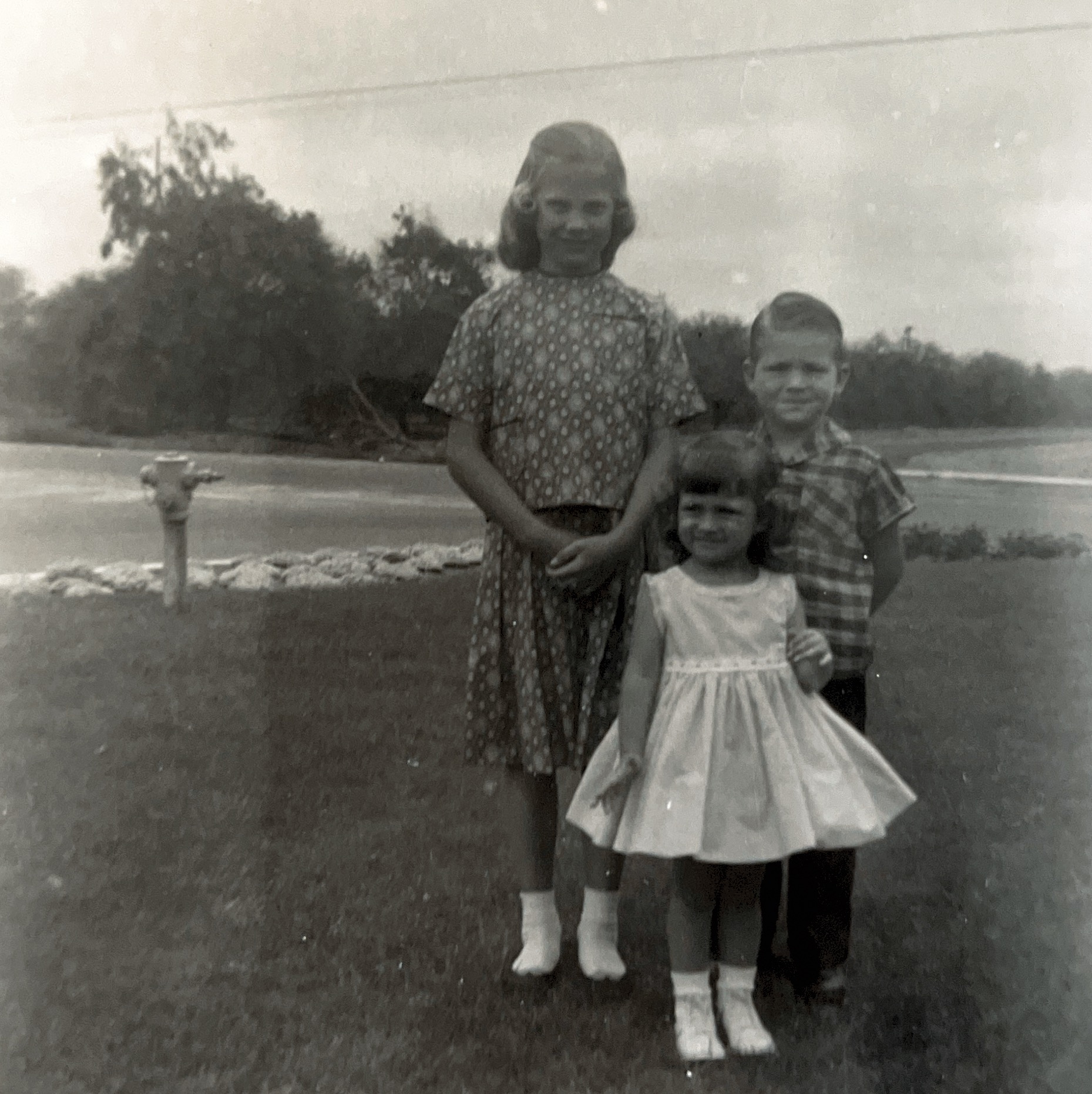Rhonda in front of Paul on the right and Marie Magleby on the left August 1959