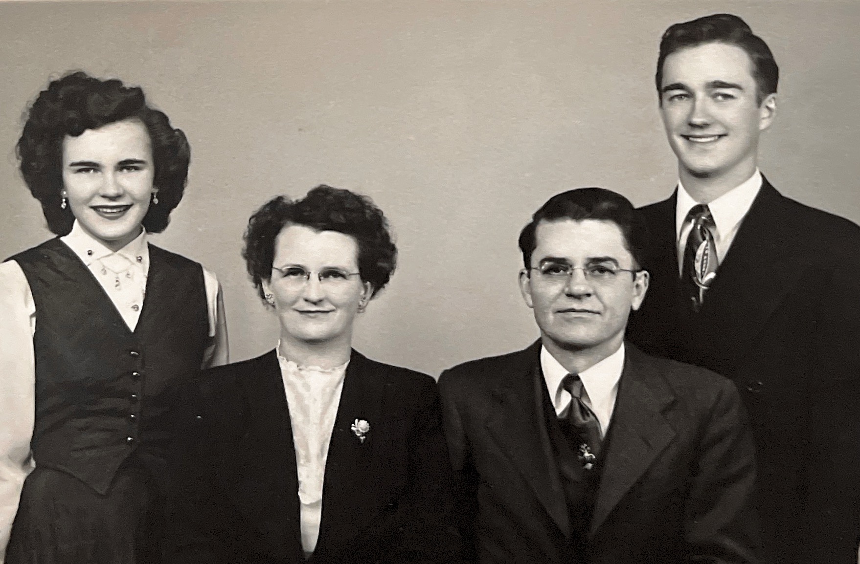 My grandfather was a Lutheran minister in a small farming town in southwest Illinois when this photo was taken of his family: daughter Delores, wife Ruth, Waldemar, and Herb (who would later become my dad). Probably 1948.