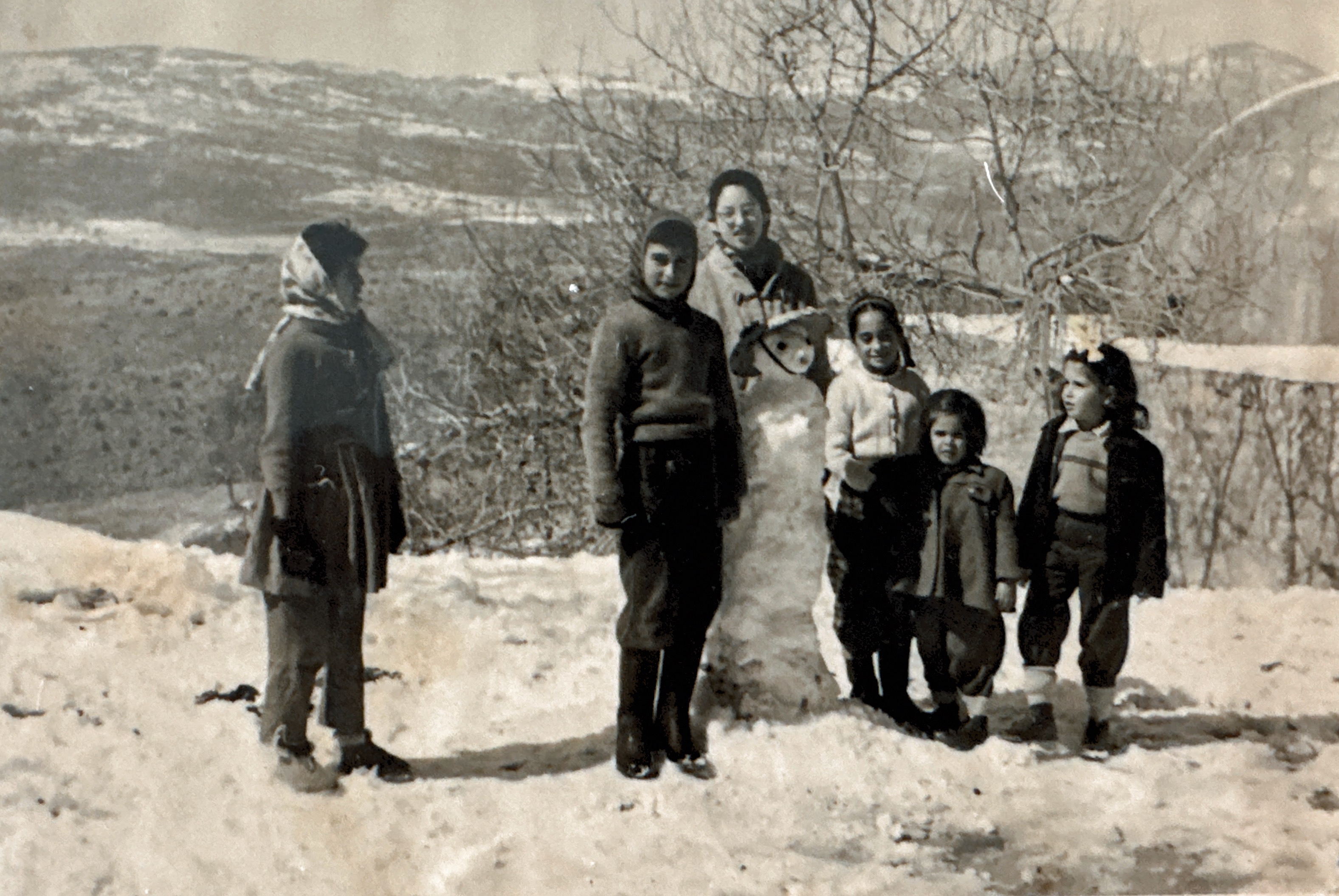 1957 or 59 snow in Tzfat in front of our house, with Yehudit and Dorit