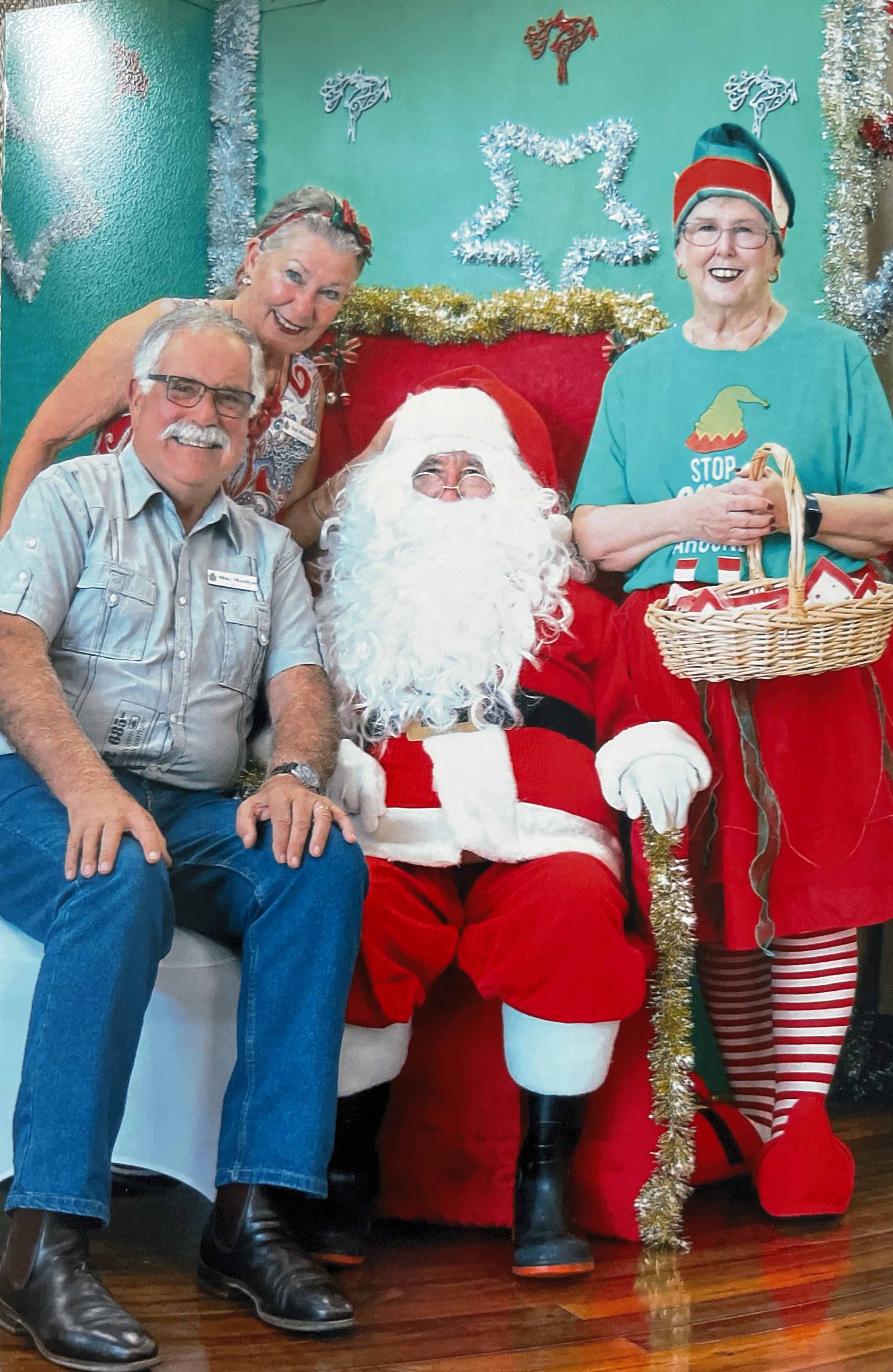 Christmas 2021 Photo with Santa and his little helper.