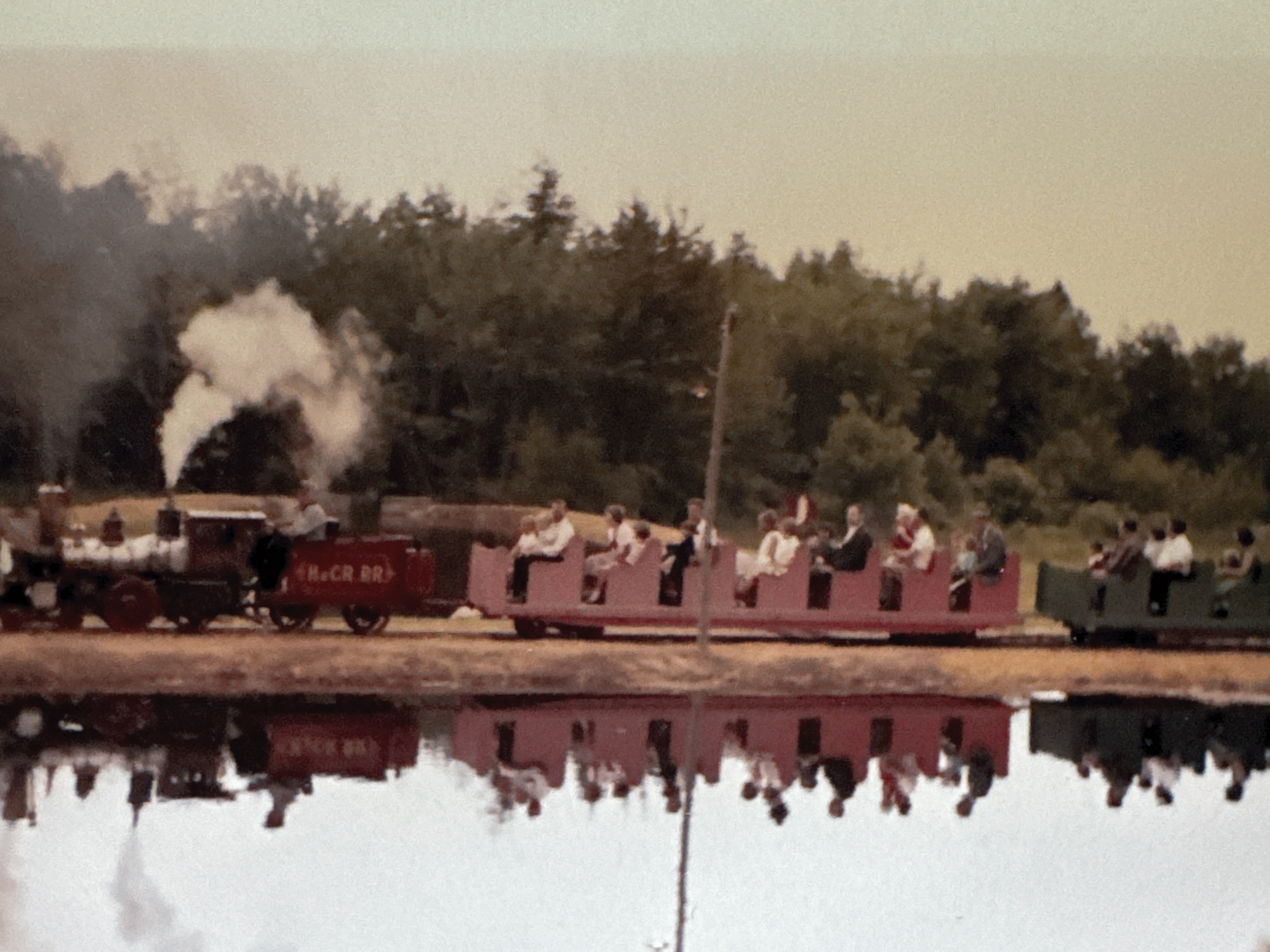 Train at Stop & Shop plaza in 1959. Water in front is a cranberry bog.