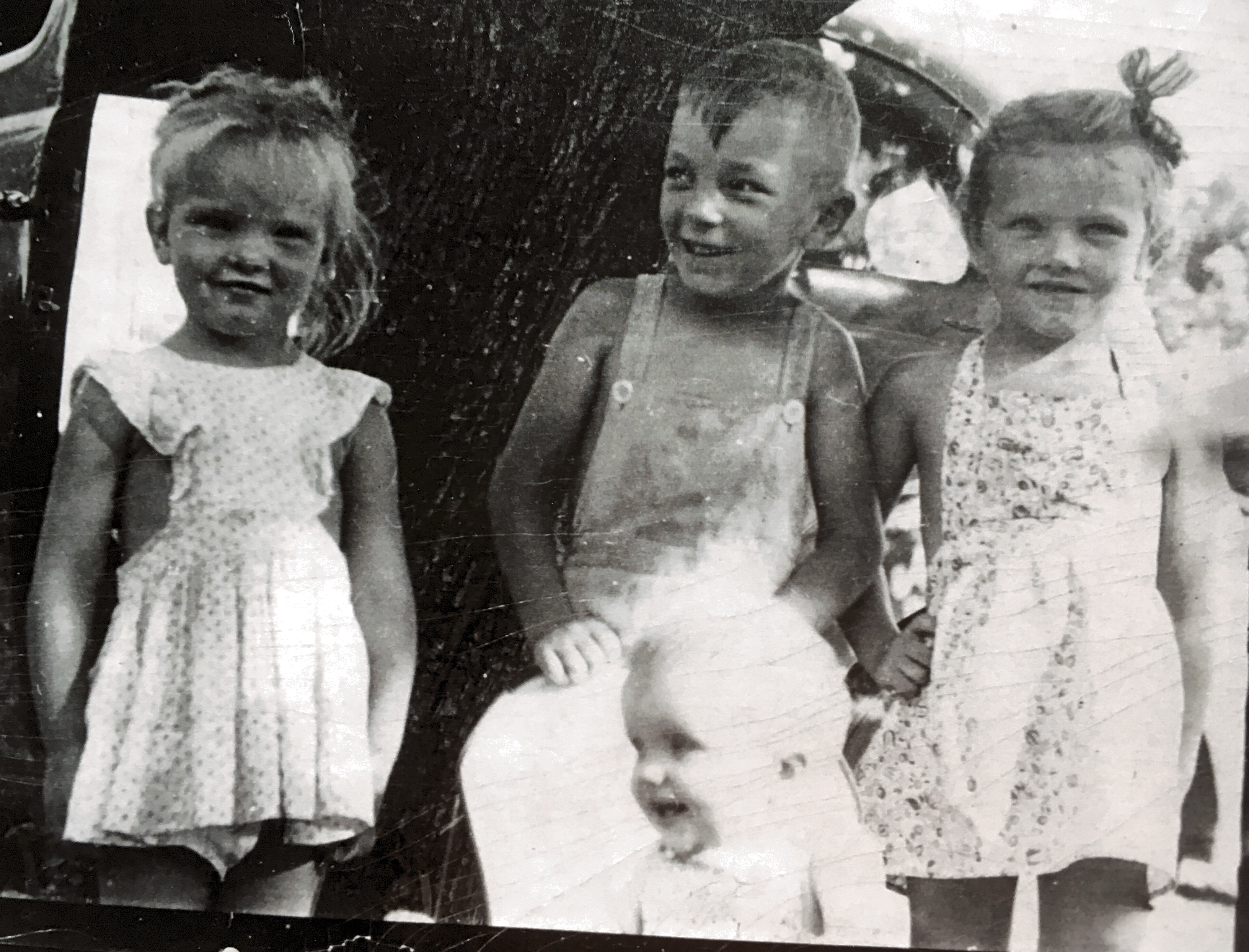 Fleming Cousins
L to R 
Diane Fleming Quince, Dick Stufflebeem, Connie Fleming Huebsch., baby Linda Fleming Payne 1947?