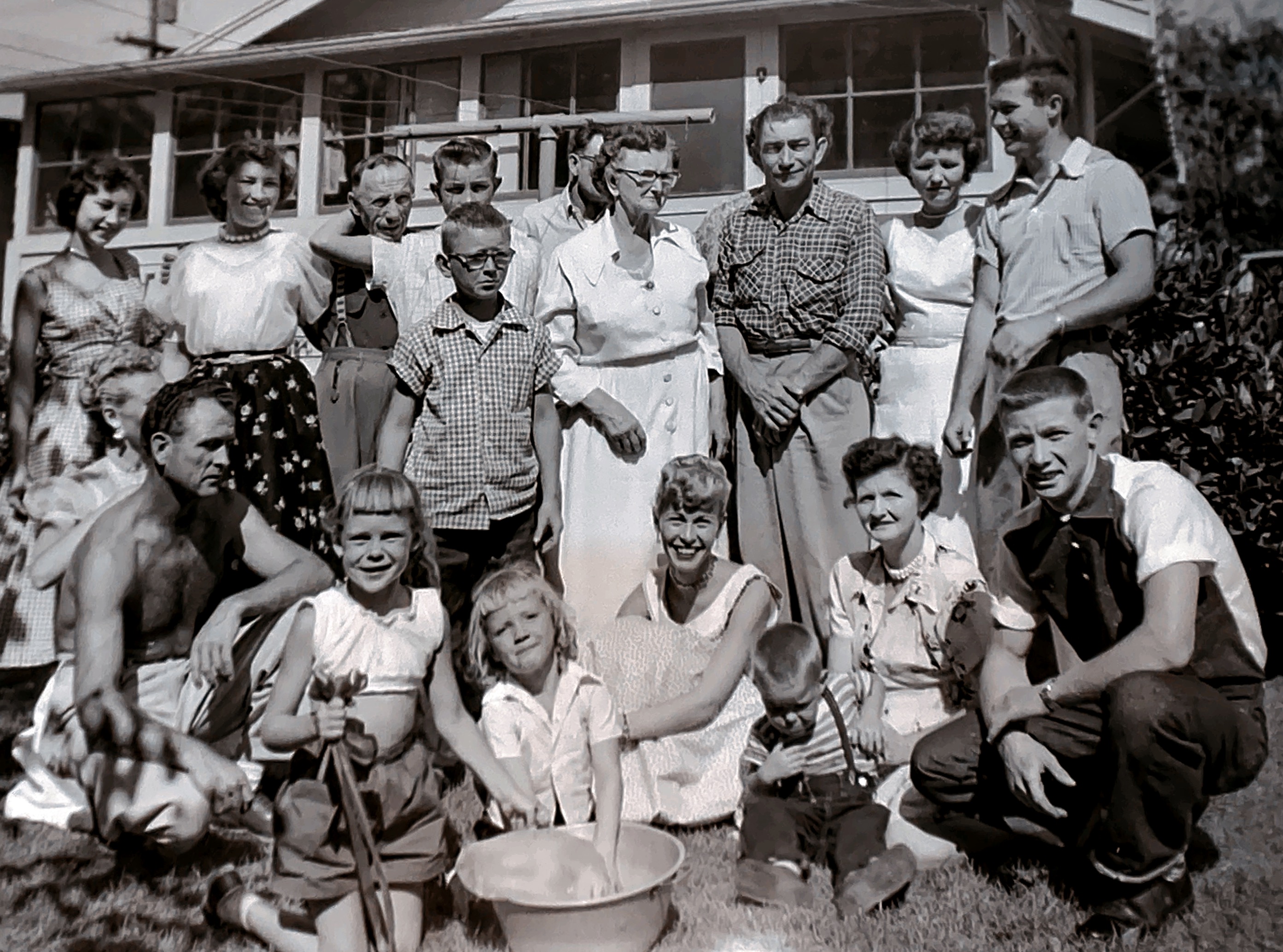 Grandma and Grandpa Green’s backyard.  Birthday celebration for Grandpa Green and Phyllis Oliver. 1954