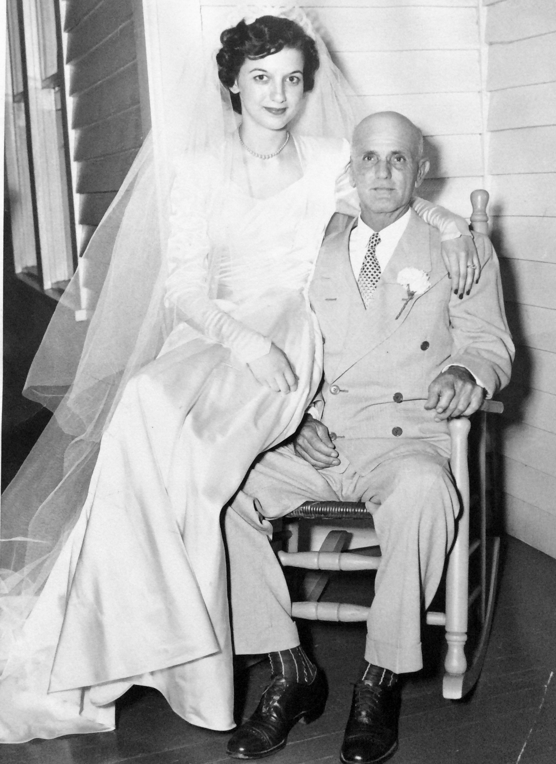 The bride is Jeannette Doster Hawkins, with her father, my uncle Jott Doster.  While she and Reggie were on their honeymoon Uncle Jott had a stroke and died several days later.  She was a 1949 graduate of Winder High Schoool ( the last year of 11th grade graduation, the next year Ga. added a 12th grade requirement) and was attending a business college in Atlanta where she met Reg. Hawkins, a super nice guy who won her heart.