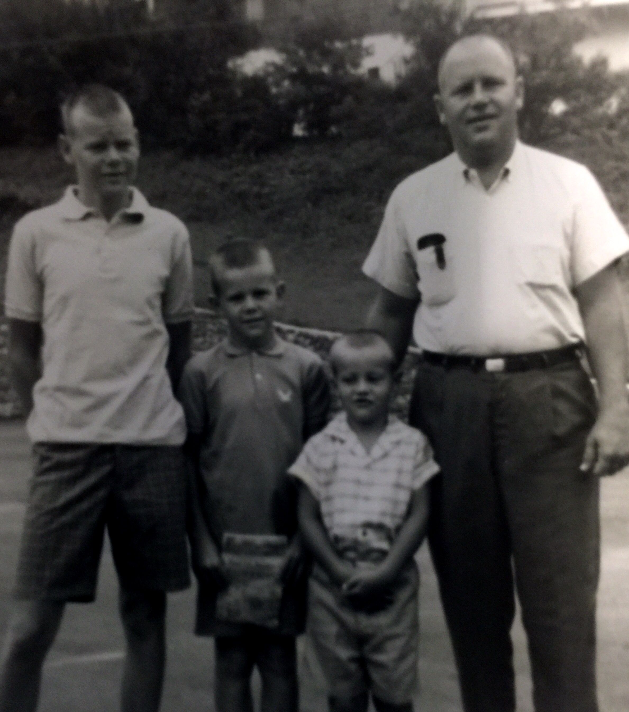 Earl C. Slay and sons, Carey, Johnny, and Mark, around 1959.
