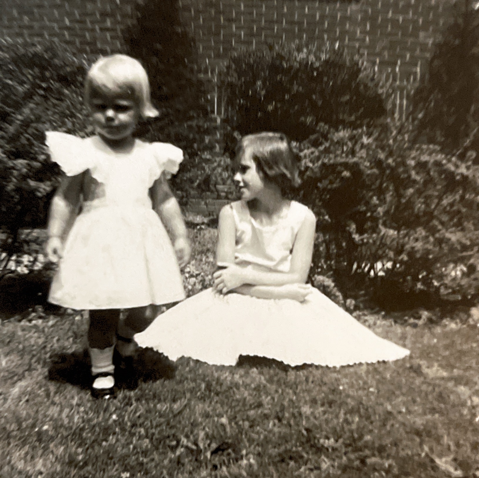 Mary Conklin and Cindy Conklin in the courtyard at 110 W University Parkway. Summer 1955 