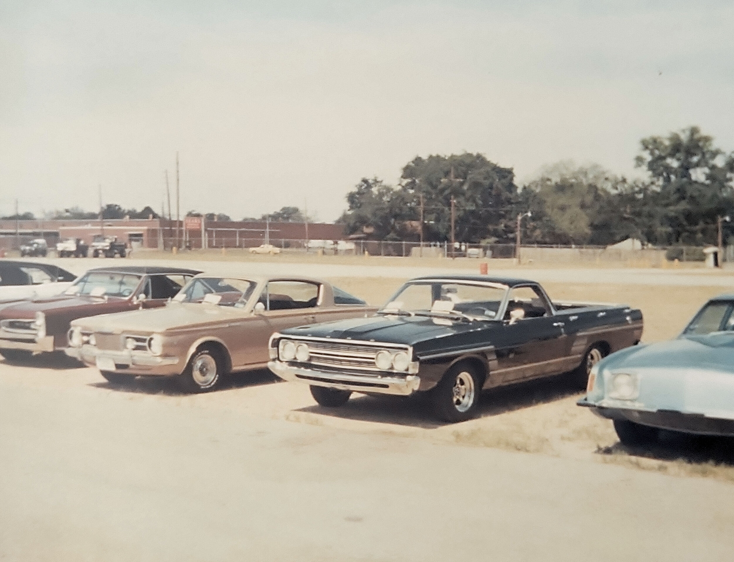 1968 Ford Ranchero next to our 1965 Barracuda. State Fairgrounds mid 80's

