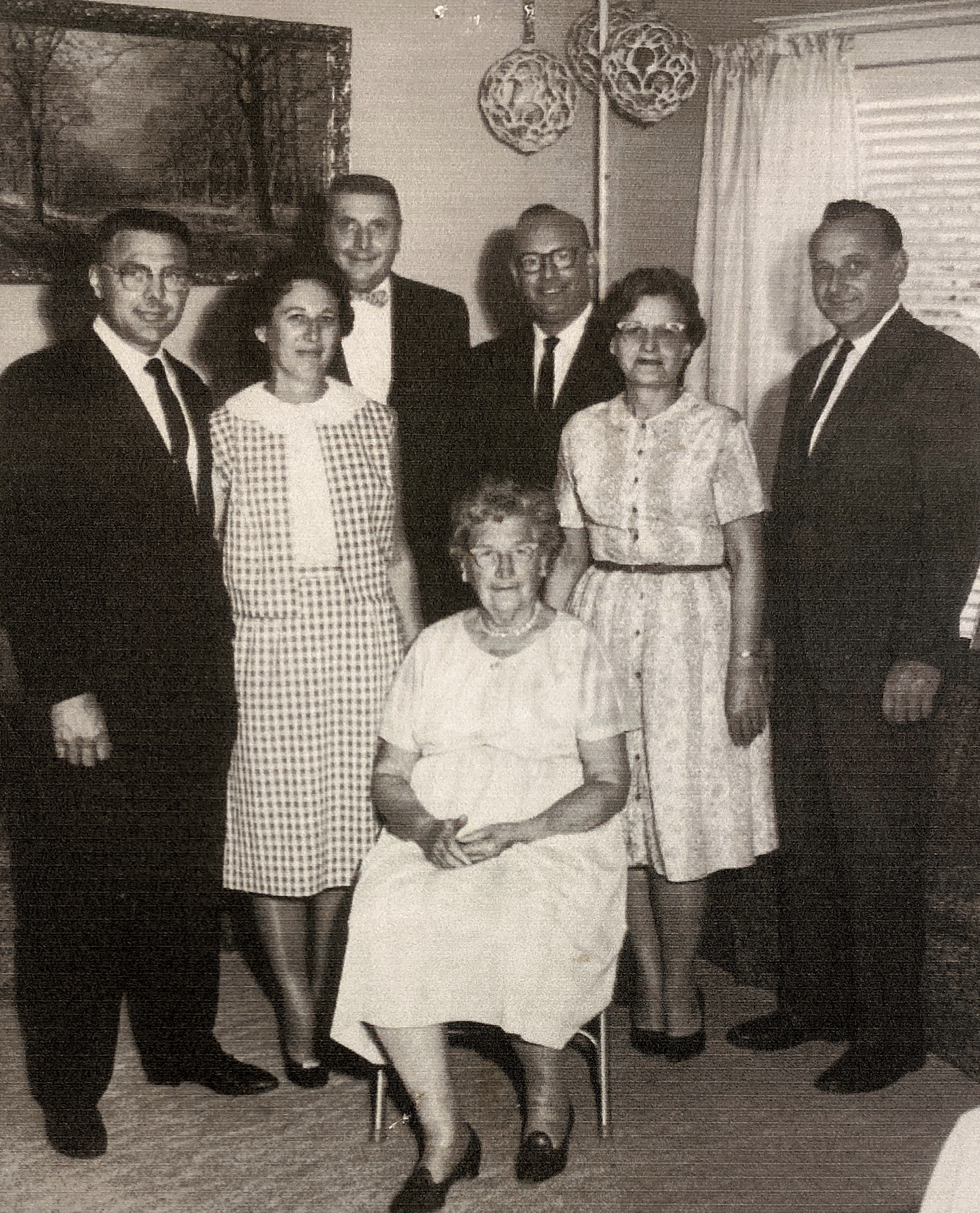 This photo was taken in 1965 for grandma’s 75th birthday.  Nelson, Marian Banks, Robert, Kenny, Betty Brown, Norman “Mike” with Emma Margaret ‘Neuman’ Blakley