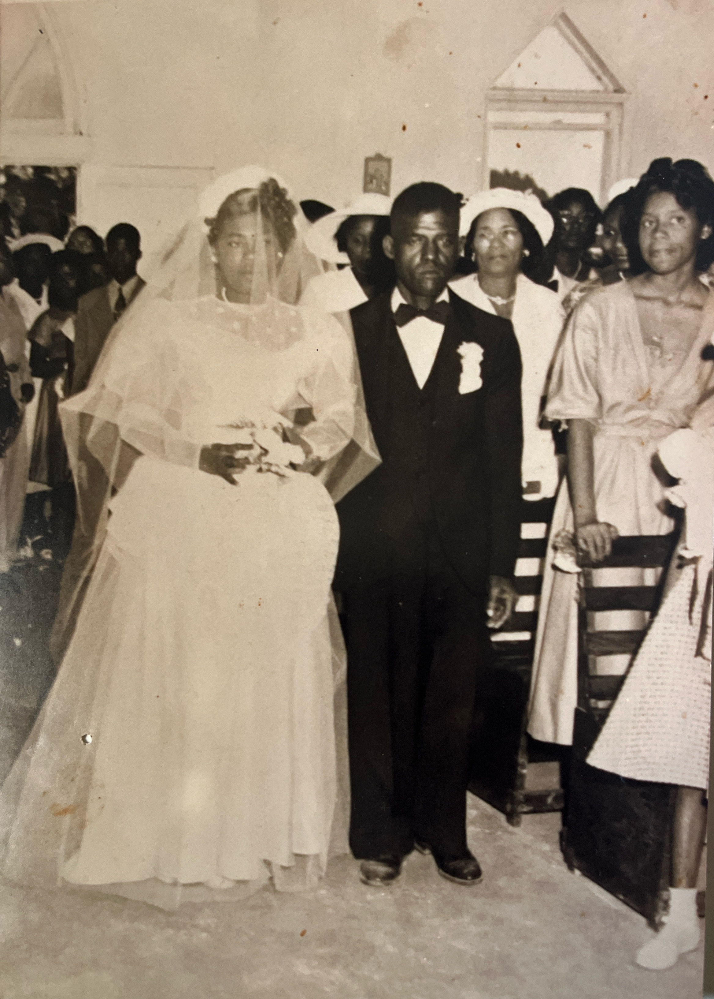 Norman and Helen Wedding Day, Escorted by ISSAC TAYLOR,SR.
       April 1953