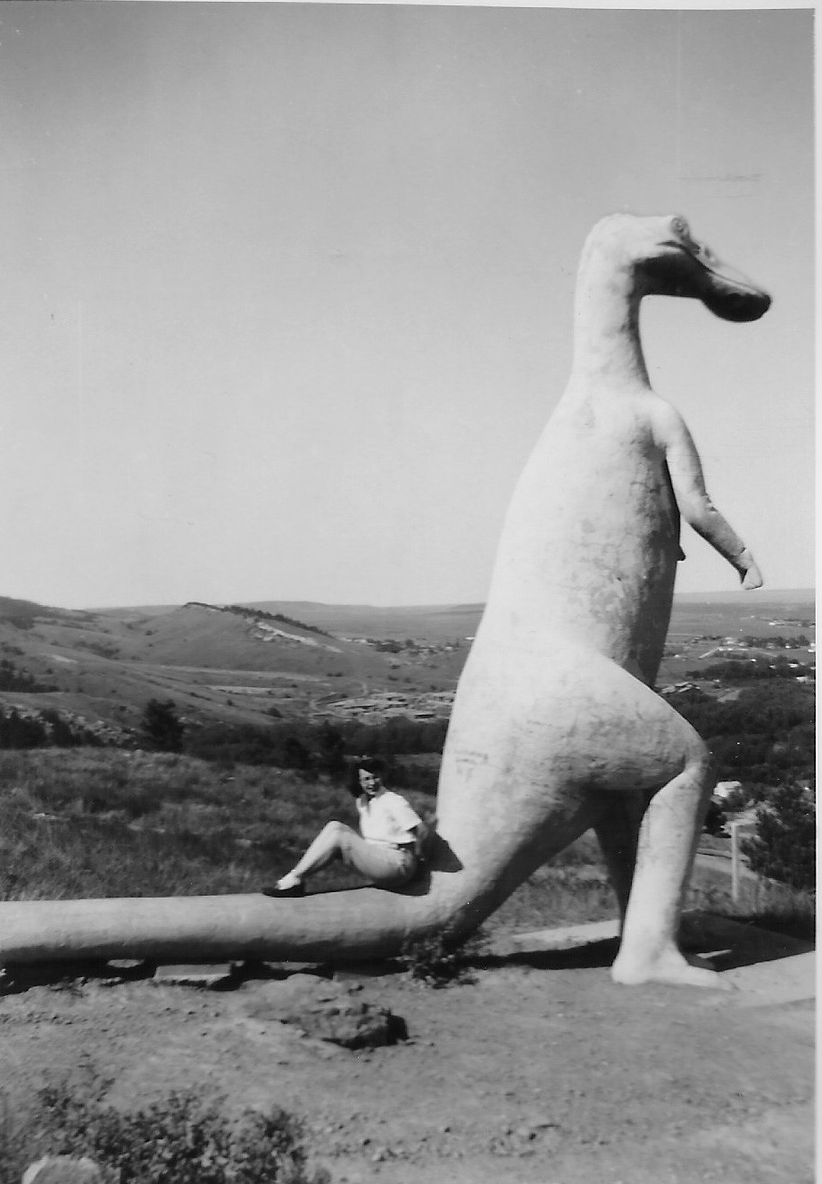 My great-grandma Audrey on a dinasour in the dinaour park in Rapid City, SD in the 1940s. The dinasour park was made in 1936. Our family visited in the summer of 2022.