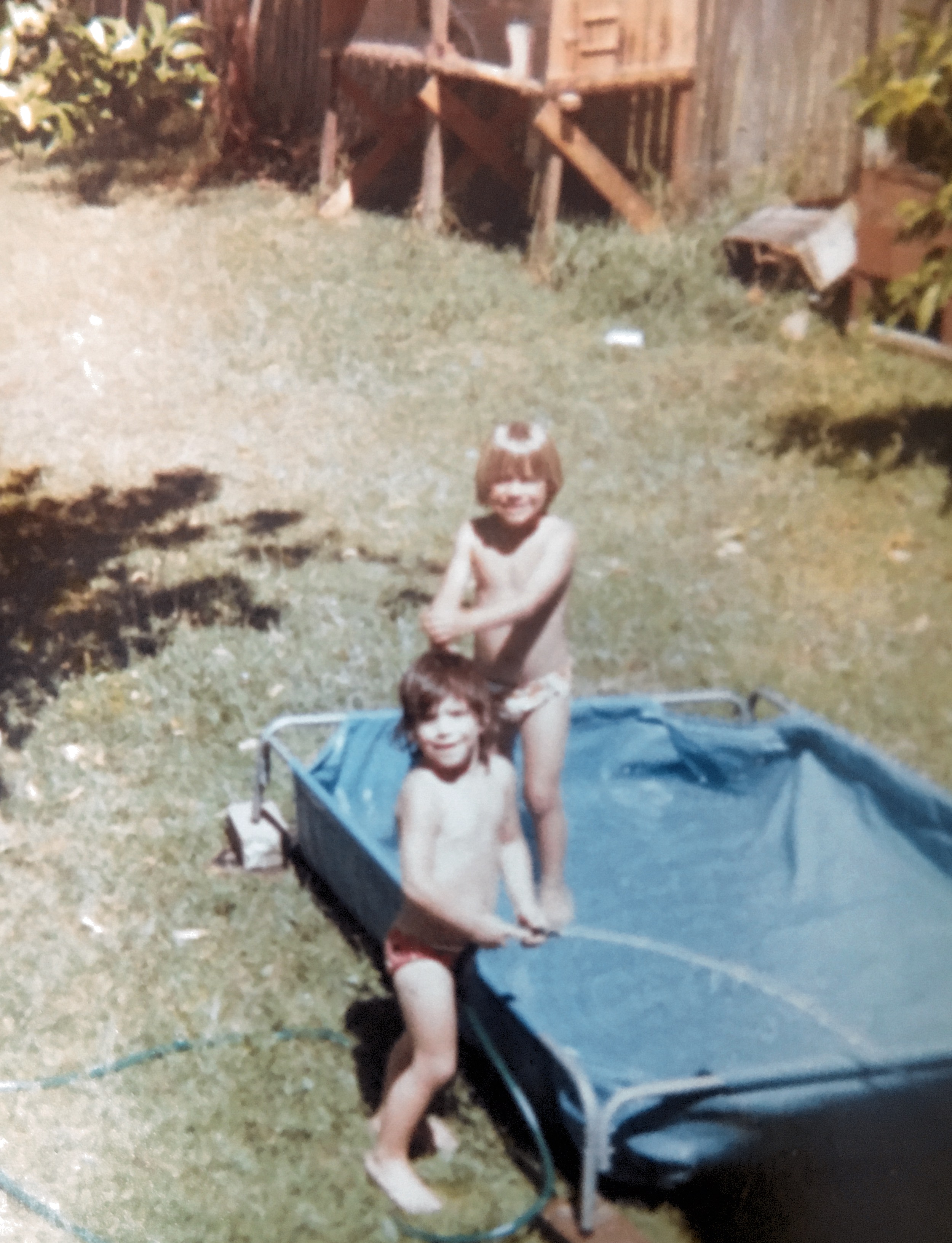 Adam and Simone cooling off on a hot summer day 1976