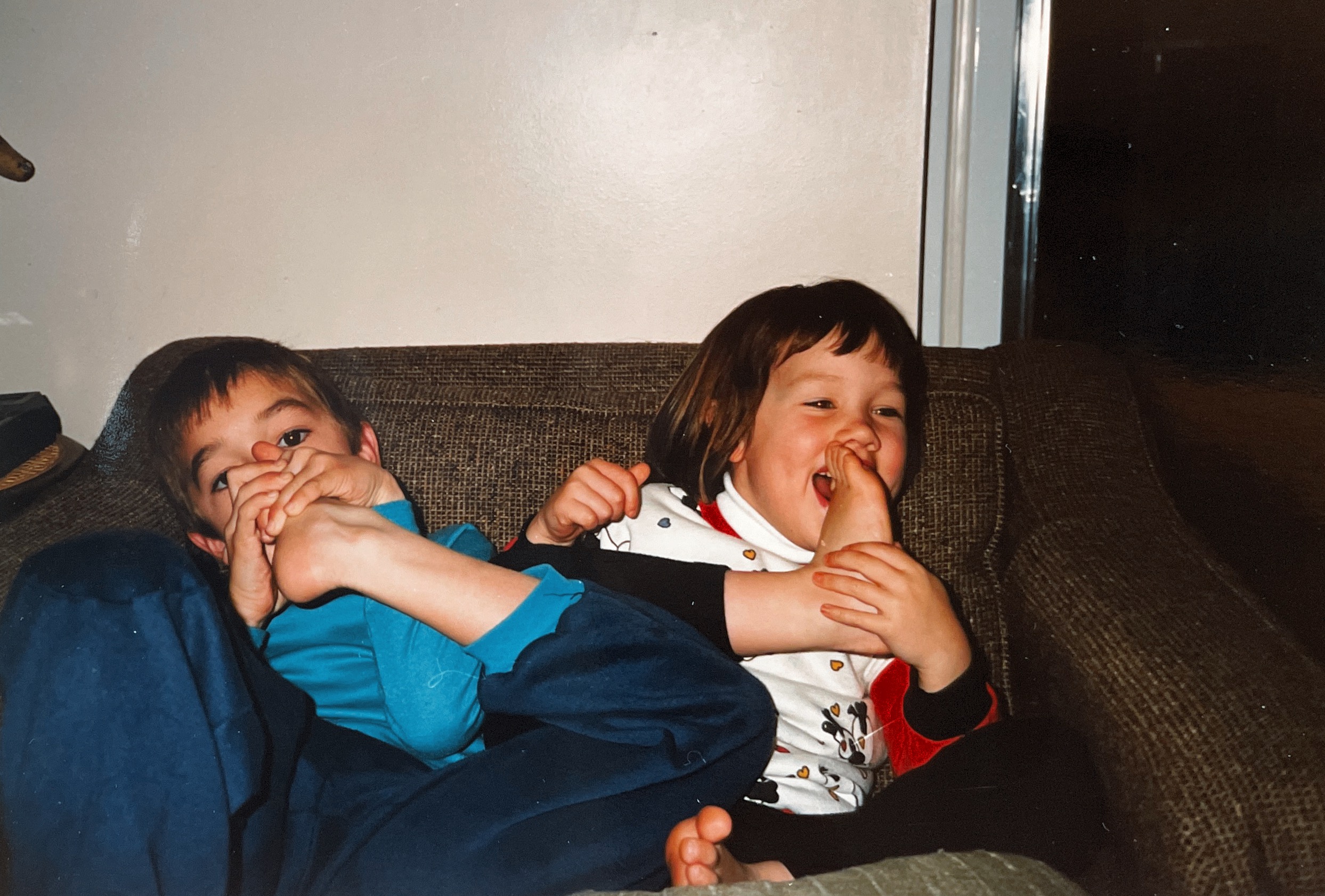July 1989 eating their toes!