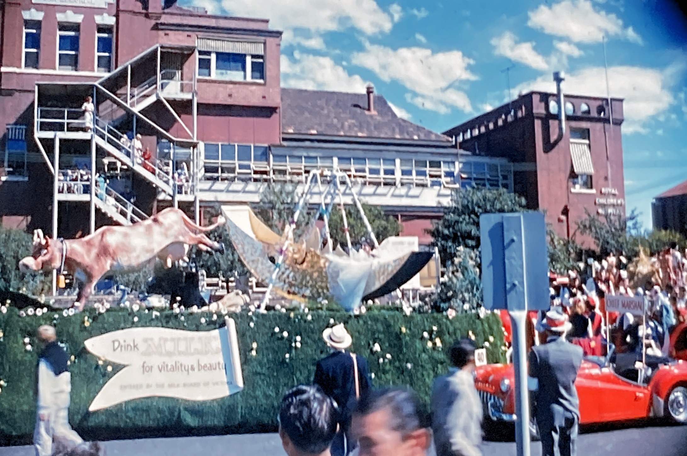 ‘Drink milk for health and vitality!’Moomba parade 1961, with Royal Children’s Hospital in the background. Photographed by my father, Richard Scott.