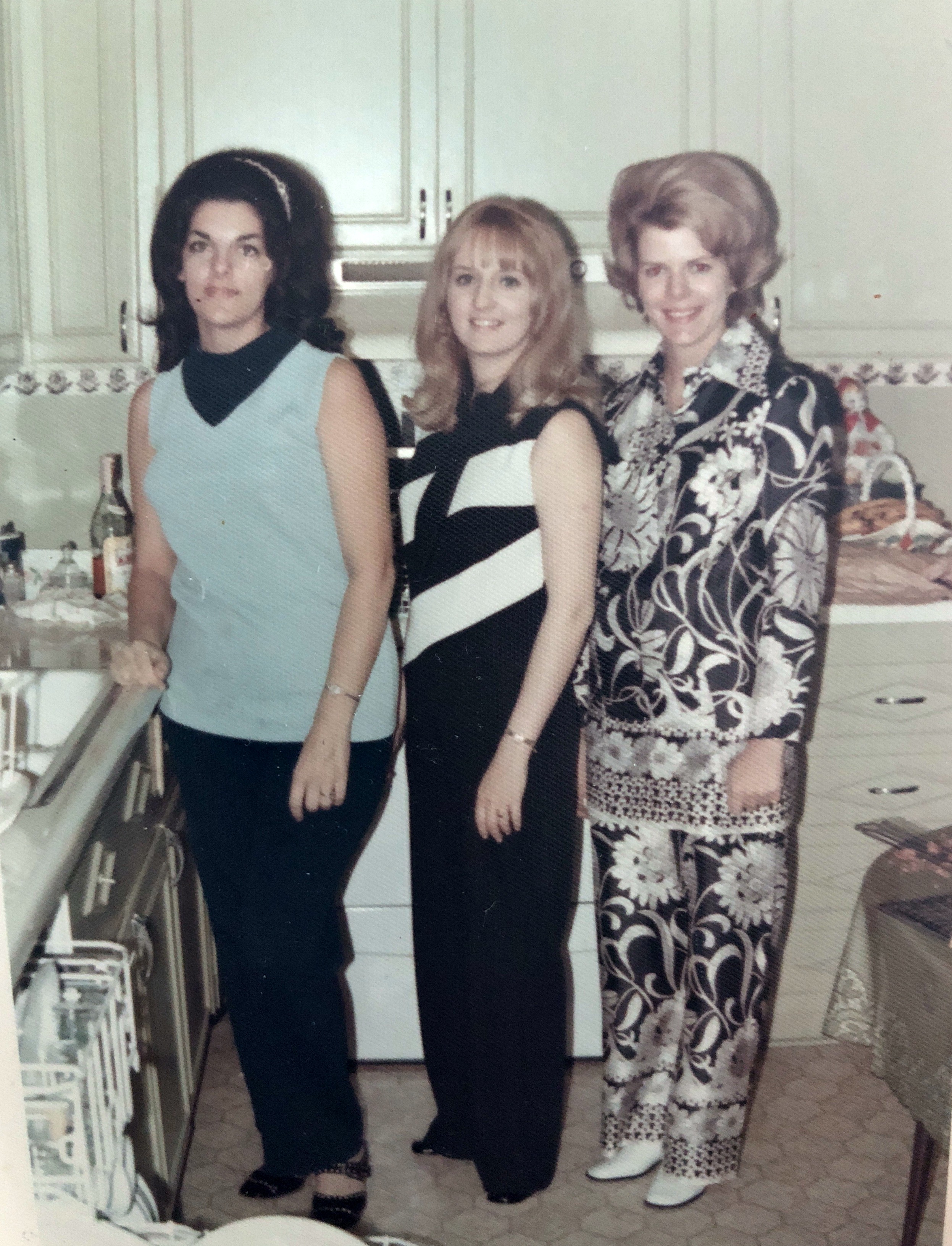 Aunt Yvonne, Aunt Linda, and Mom (Carol) in Grammy’s kitchen ca. 1970