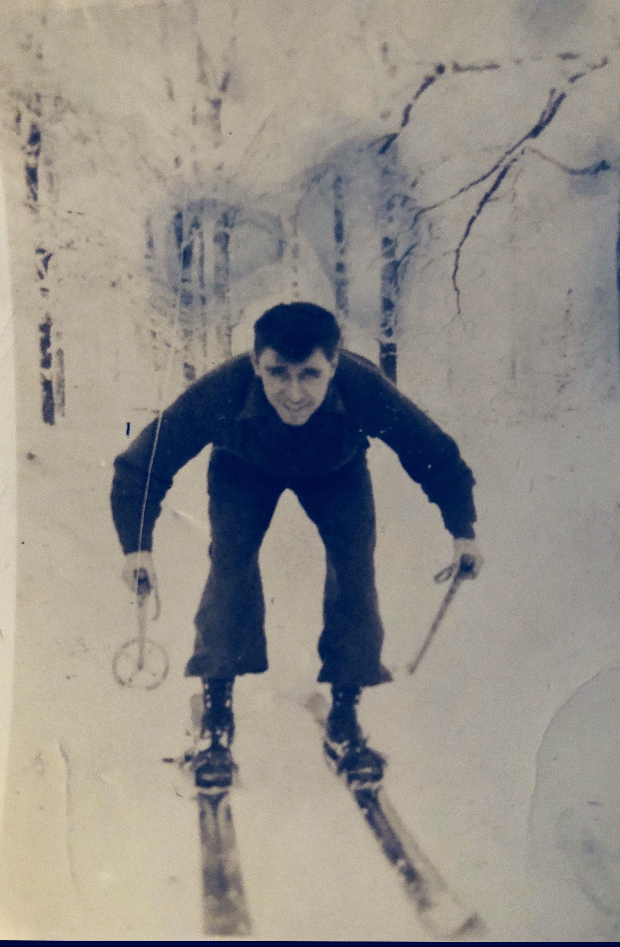 Grandfather posing like a PRO on his skiis from what i was told it was during his time overseas not sure if it was Germany but one of the countries during world war 2 but in that timeline 