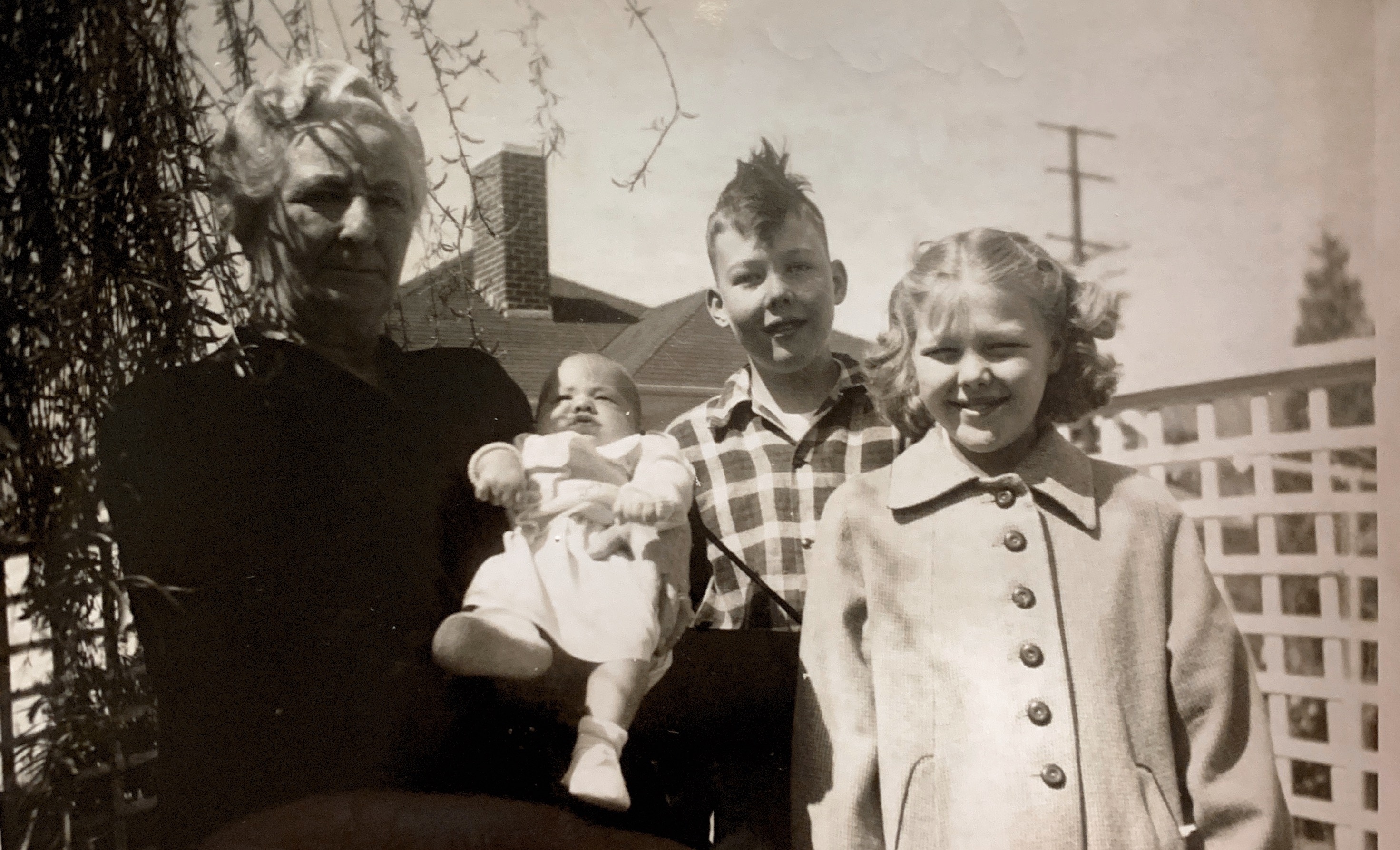 Lillian Boyd “Aunt Lil”, Susan Keller, Dale & Karen Madden. April 1952. Loving the Mohawk hair Dale.