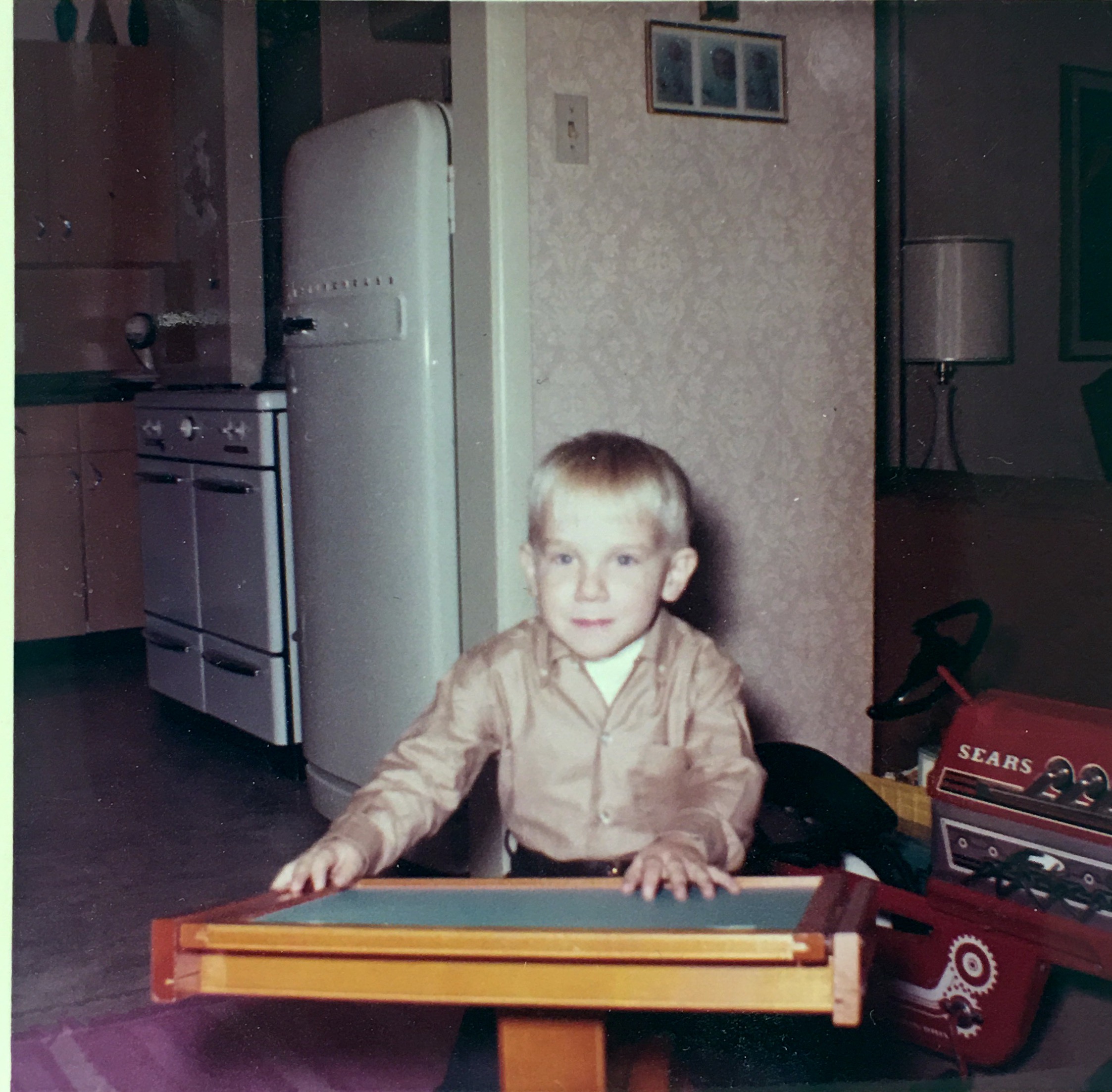‘James Scott Stroud Age 3 1965. This is me and my peg board.’ (Written on back)