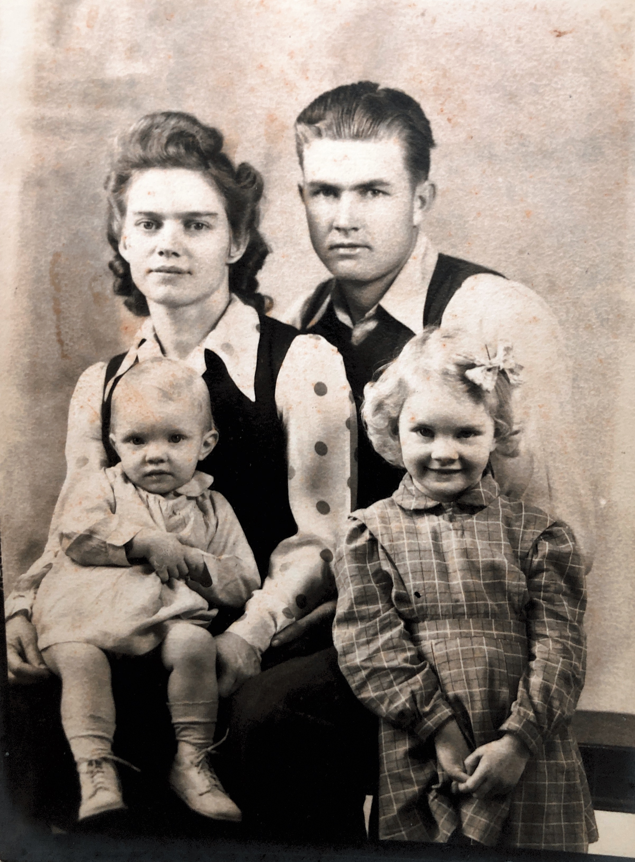 Taken in the early 1940s. My grandparents, mom and aunt. 