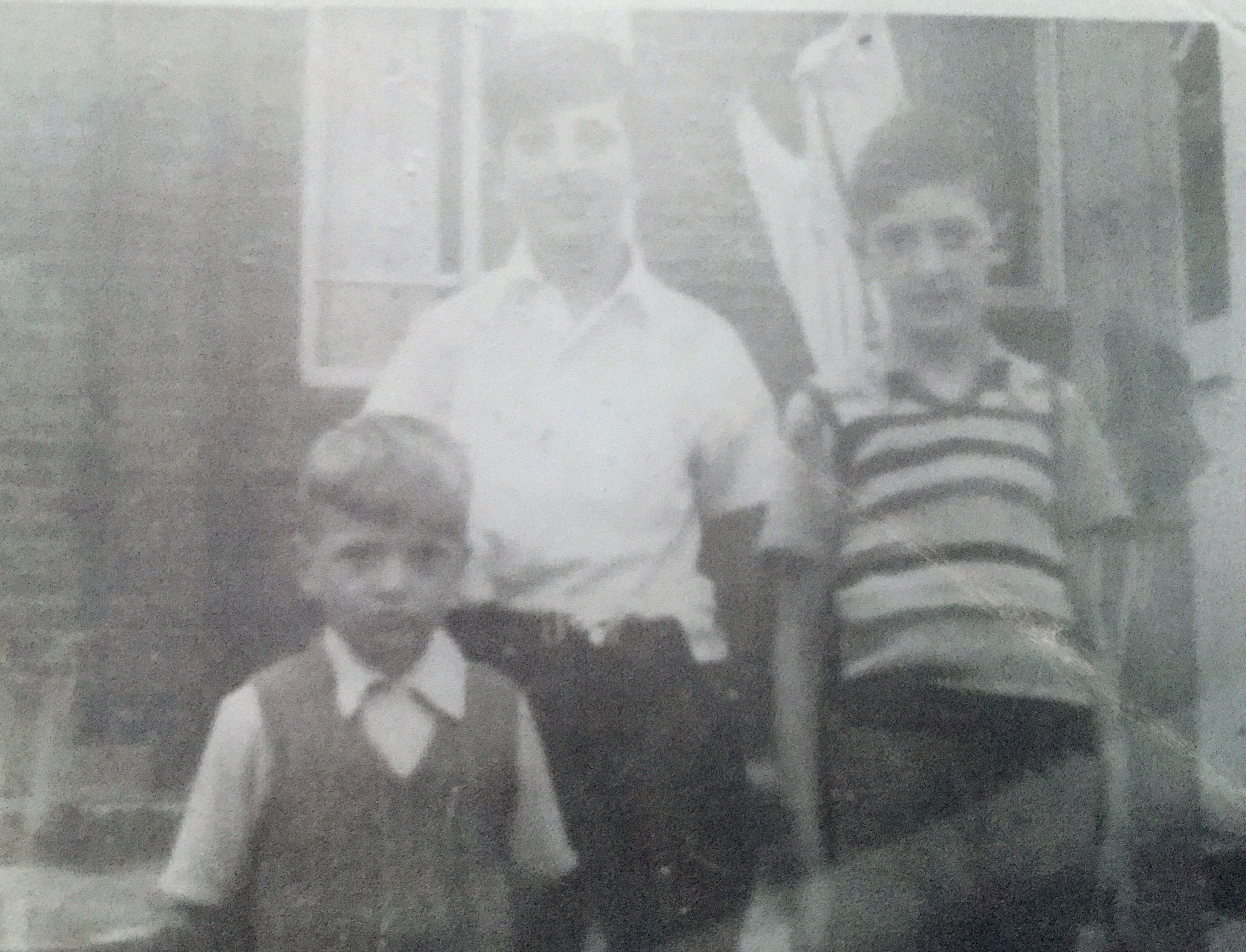 Brian,Dave, and me photo taken at 139 Leomister Road in 1958 the only phono where I am with my two brothers was taken.