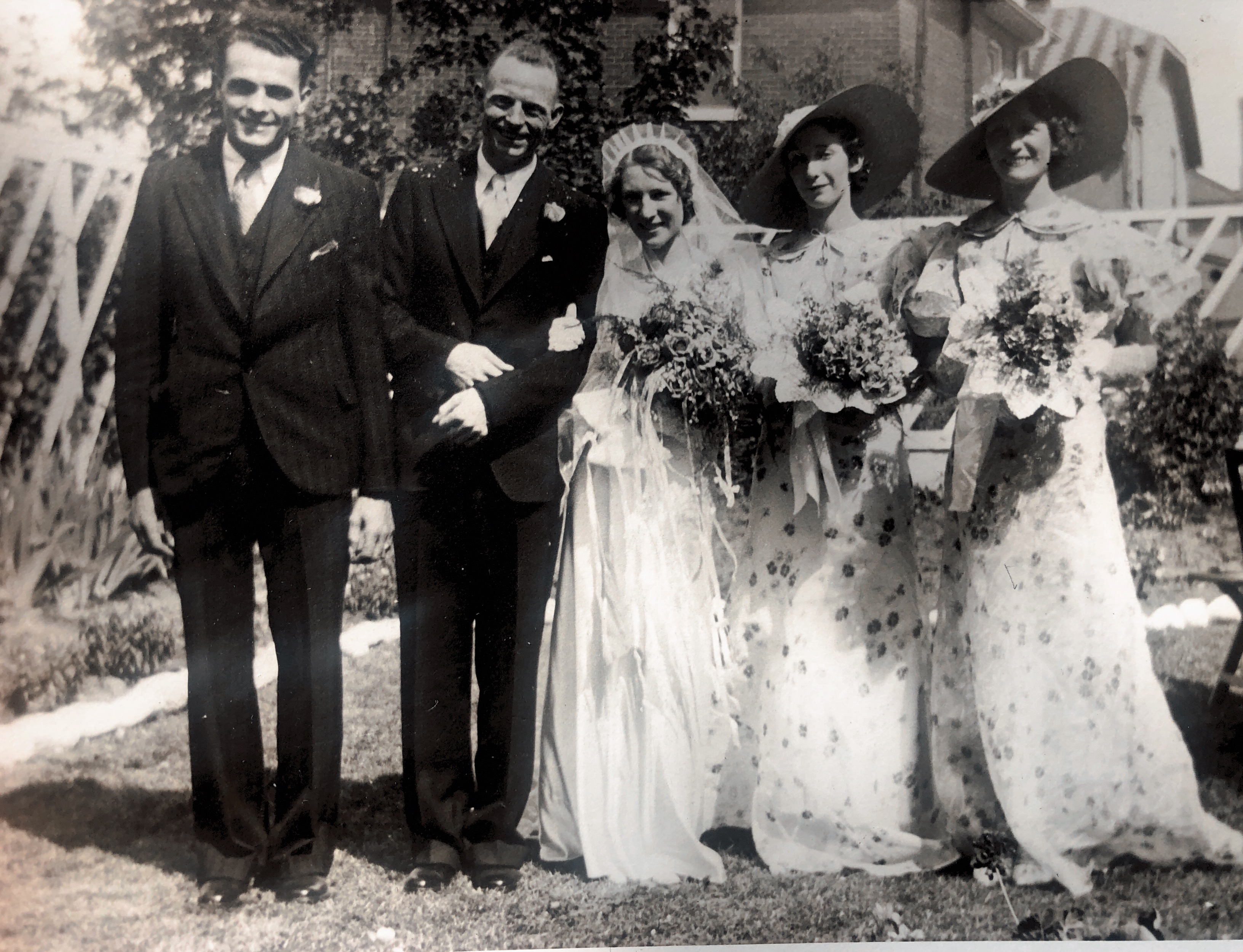Wedding of Dorothy & Harold - 1934 — left to right:  Lucas (best man), Harold (Grandpa), Dolly (Grandma), Great Aunt Connie (older sister), Great Aunt Margaret (older sister)