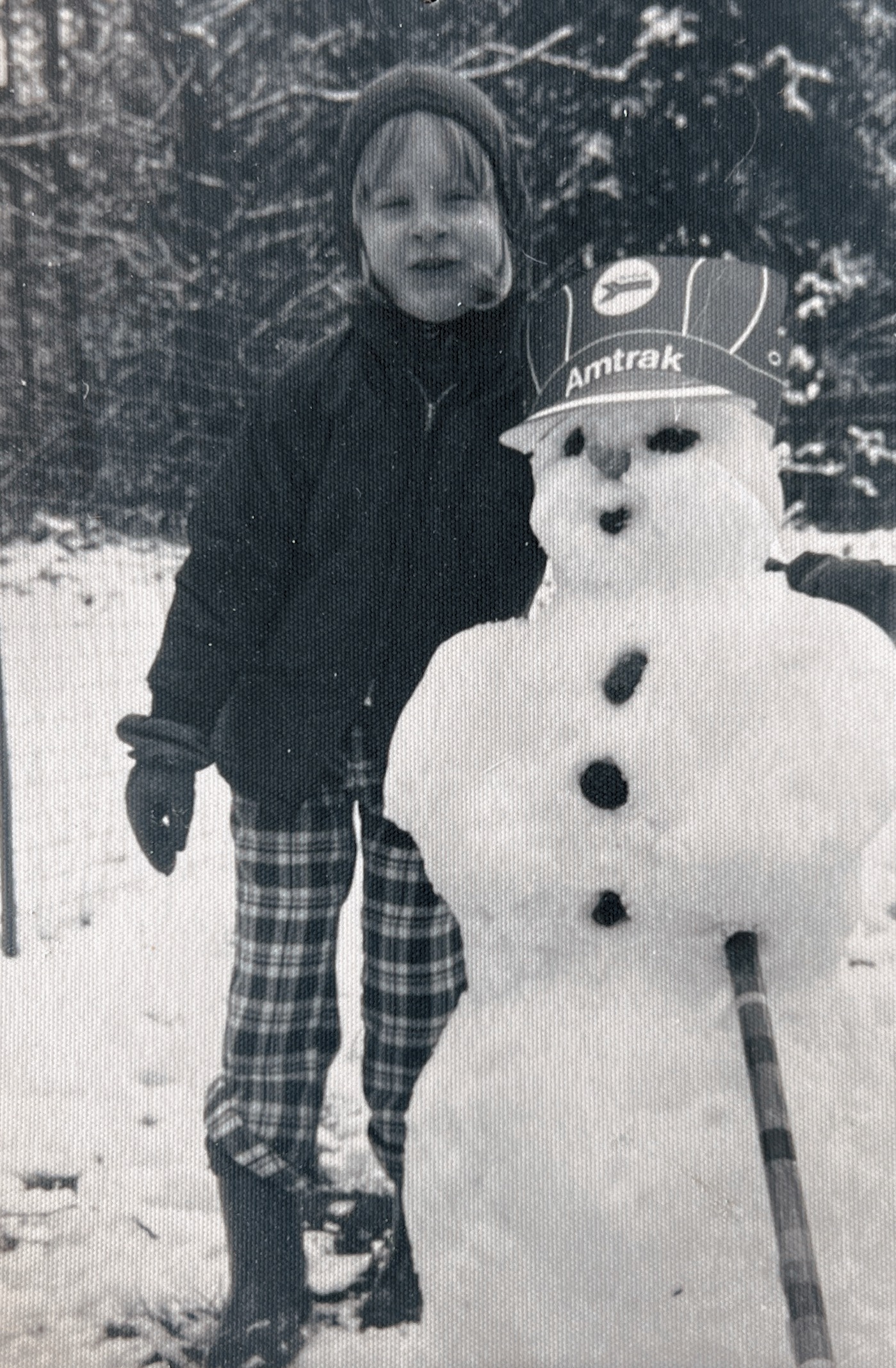 Erika Odegard with snowman circa 1975