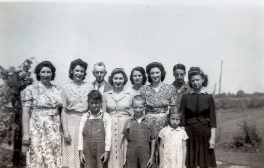 Summer of 1944 Grampa and Gramma’s family Mildred, Sarah, Roy, Ruth, Bessie, Kathryn, Wilbur, Pearl Front row:Jim, Bill and Doris
