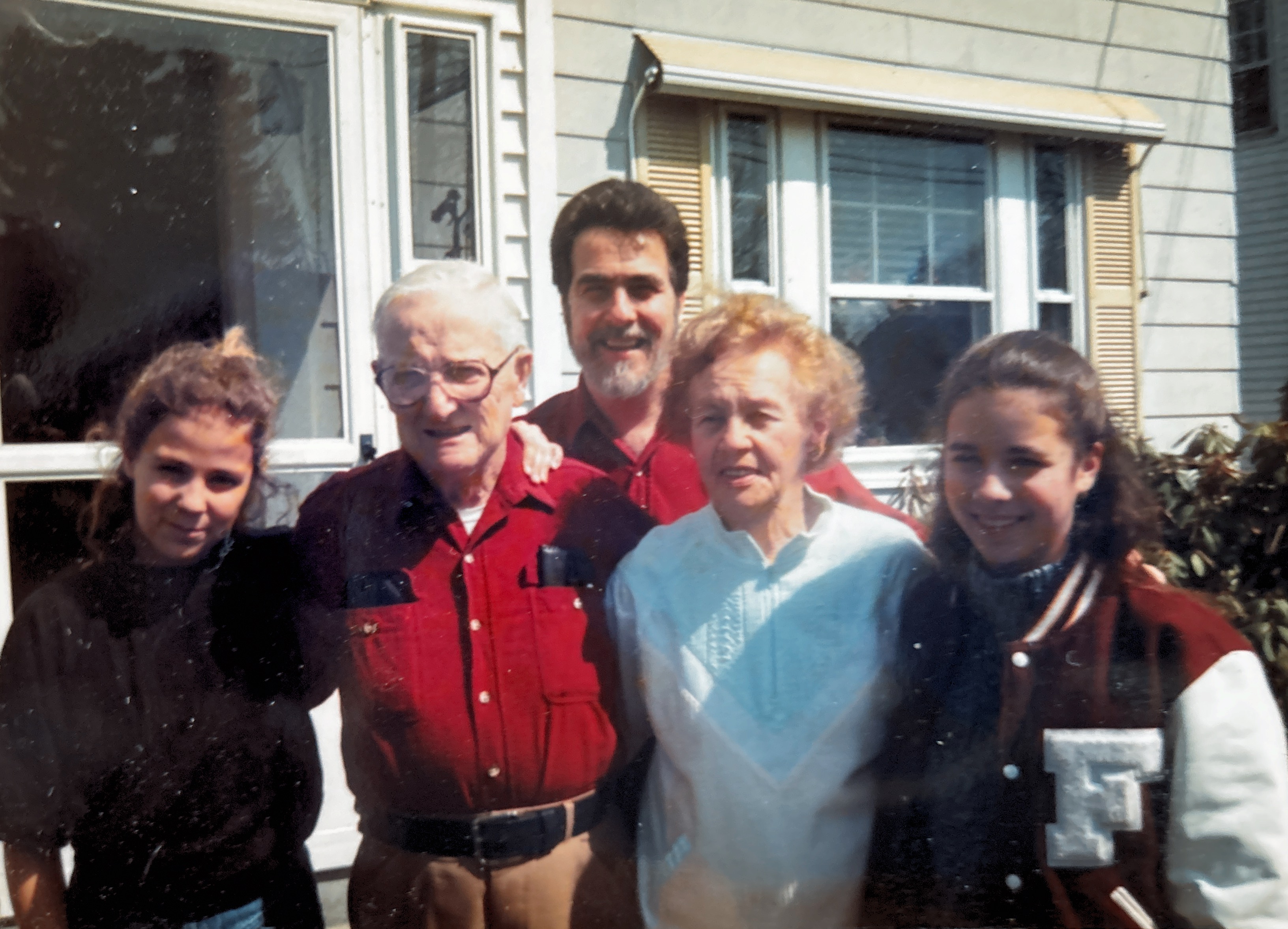 Ted & Ellen Schroll, parents to Peter Schroll with their grand daughters Erika, left, and Julie, right. 1990