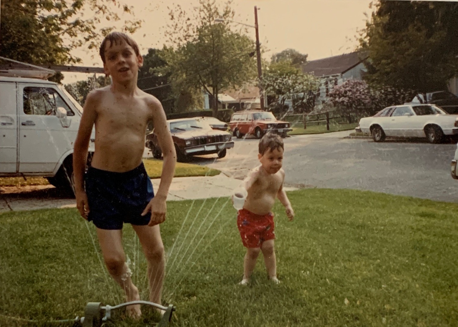 William and Michael Cooling off 1987 “Hey Dad want some? “